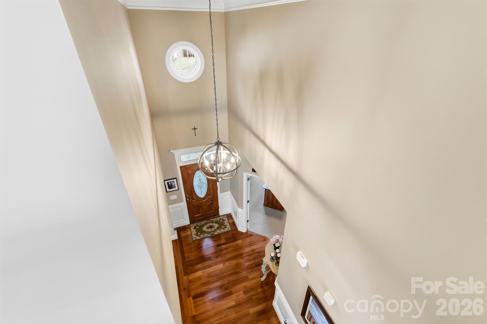 Overlooking from the bonus room into the bright and open foyer area. - 120 Harris Farm Road, Mooresville