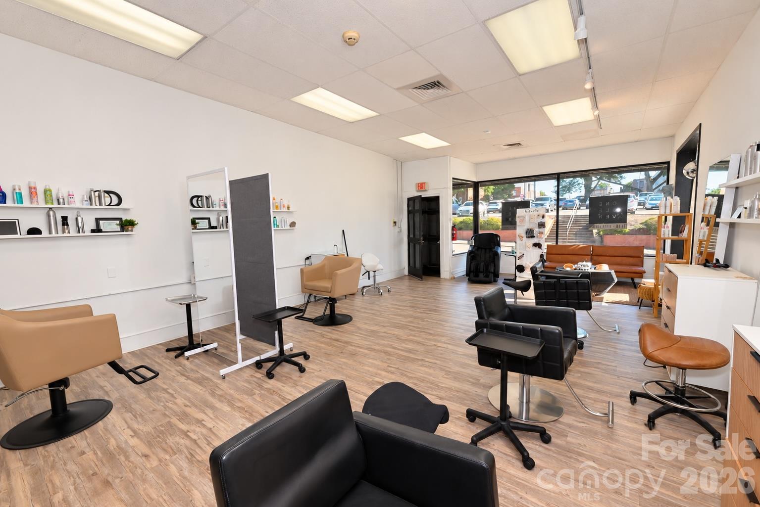 Salon side of the property. Main level is 1,810 sq. ft. With an additional 460 sq.ft. basement. - 111/113 E Water Street, Statesville