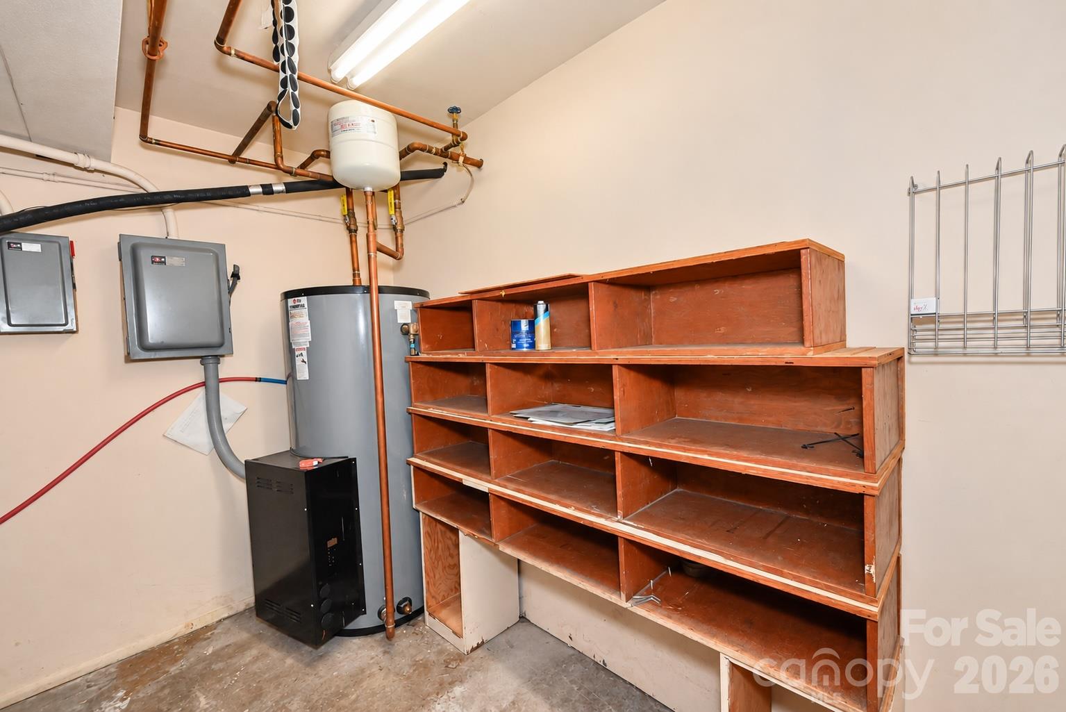 Basement area of Martial Arts side. 1,950 sq. ft. with 2 access areas directly to the street or inside access from the Main Level. - 111/113 E Water Street, Statesville