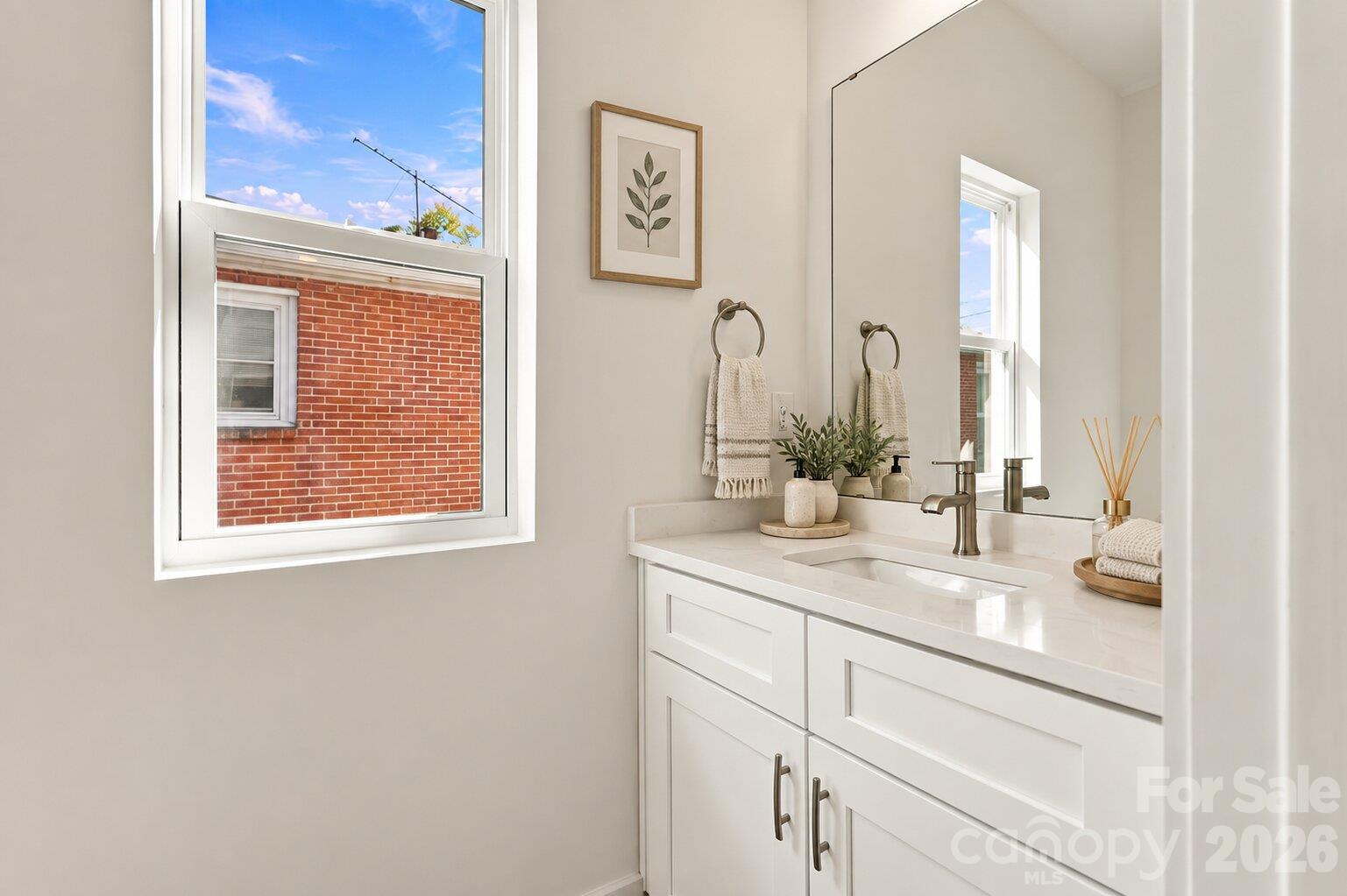 Virtually staged half bath on main - 606 N Broad Street, Mooresville