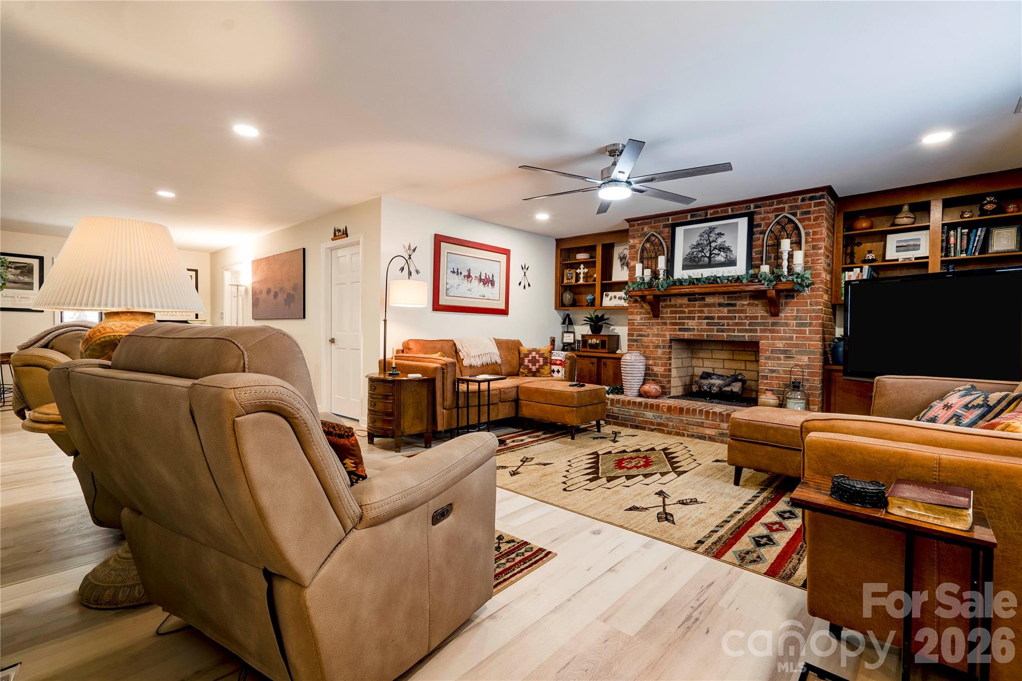 Den with gas log fireplace. - 301 Pinkney Street, Shelby