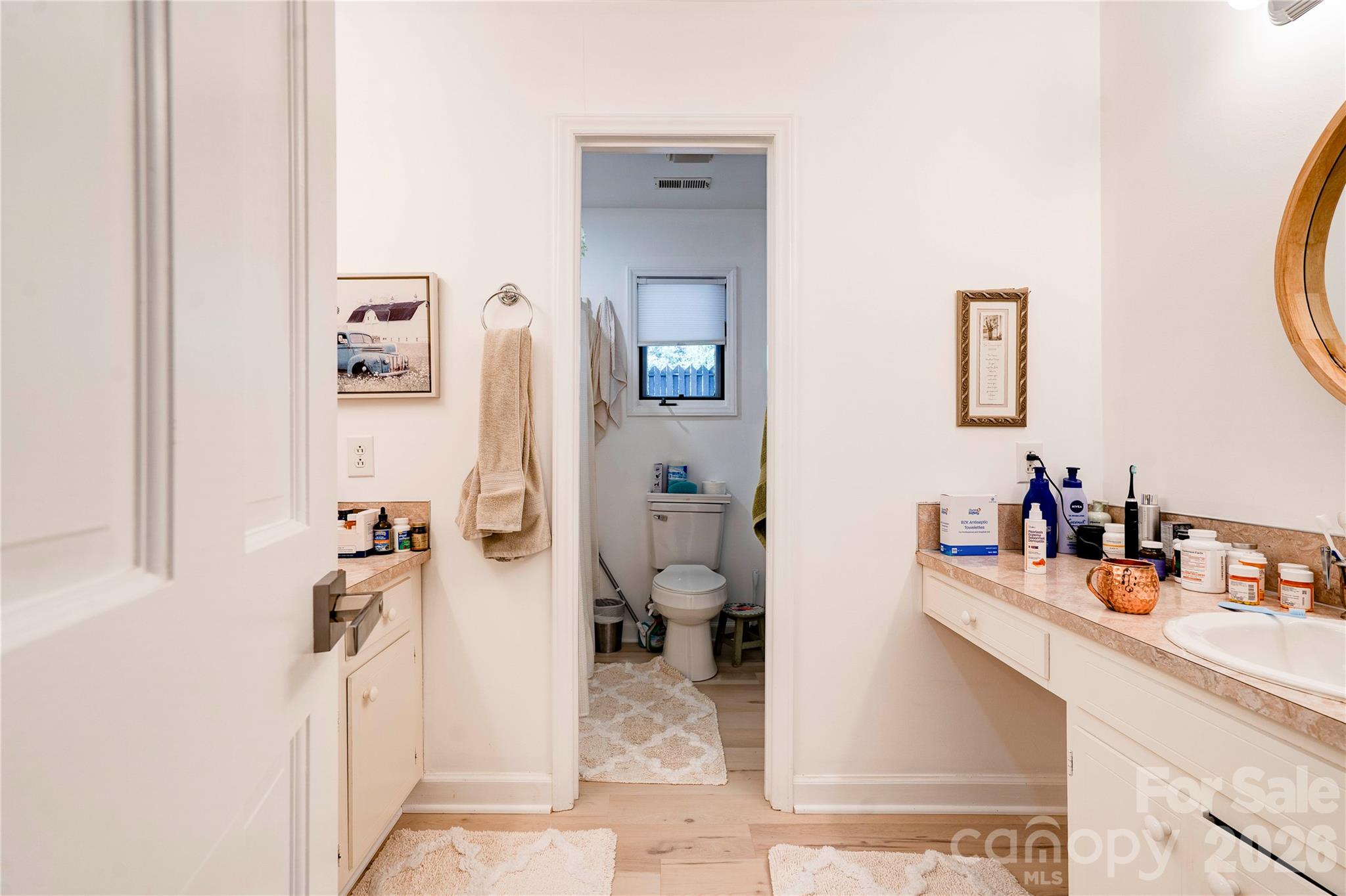 Primary Bathroom with dual sinks, walk-in shower and water closet - 301 Pinkney Street, Shelby