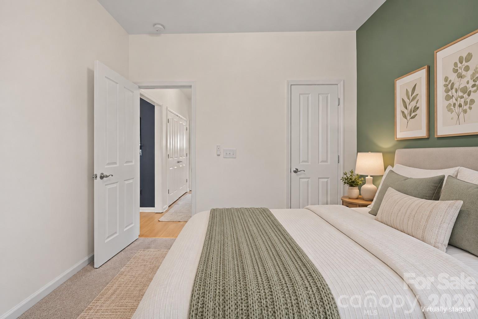 Virtually Staged bedroom 2, showing a full sized bed - 14525 Holly Springs Drive, Huntersville