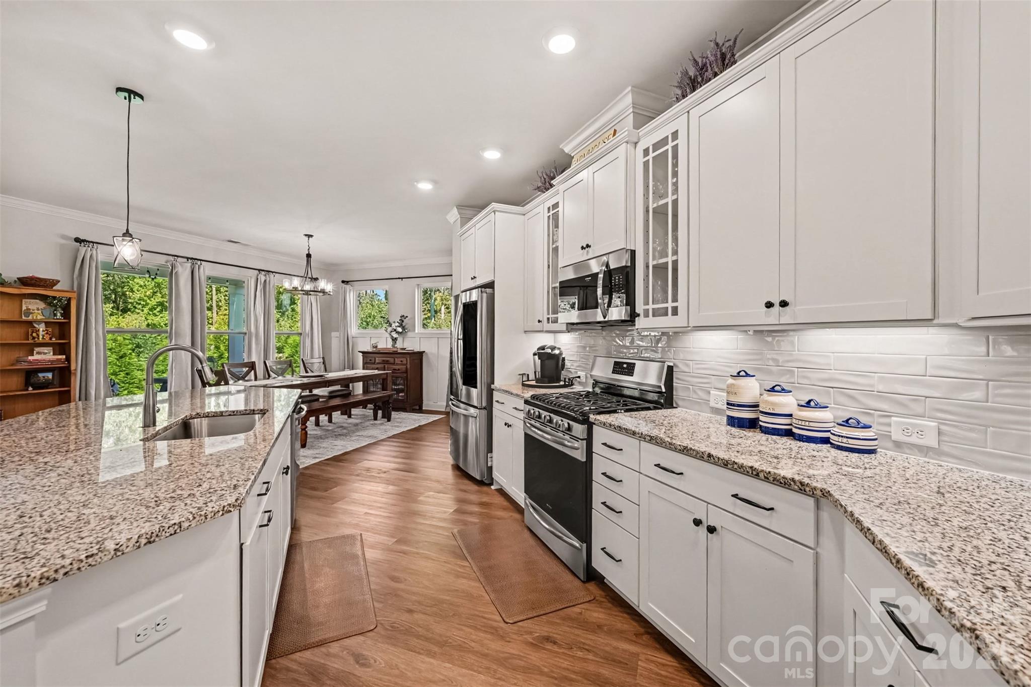 White cabinetry, generous counter space, and a layout designed for everyday living. - 2703 Wedgewood Court, Denver