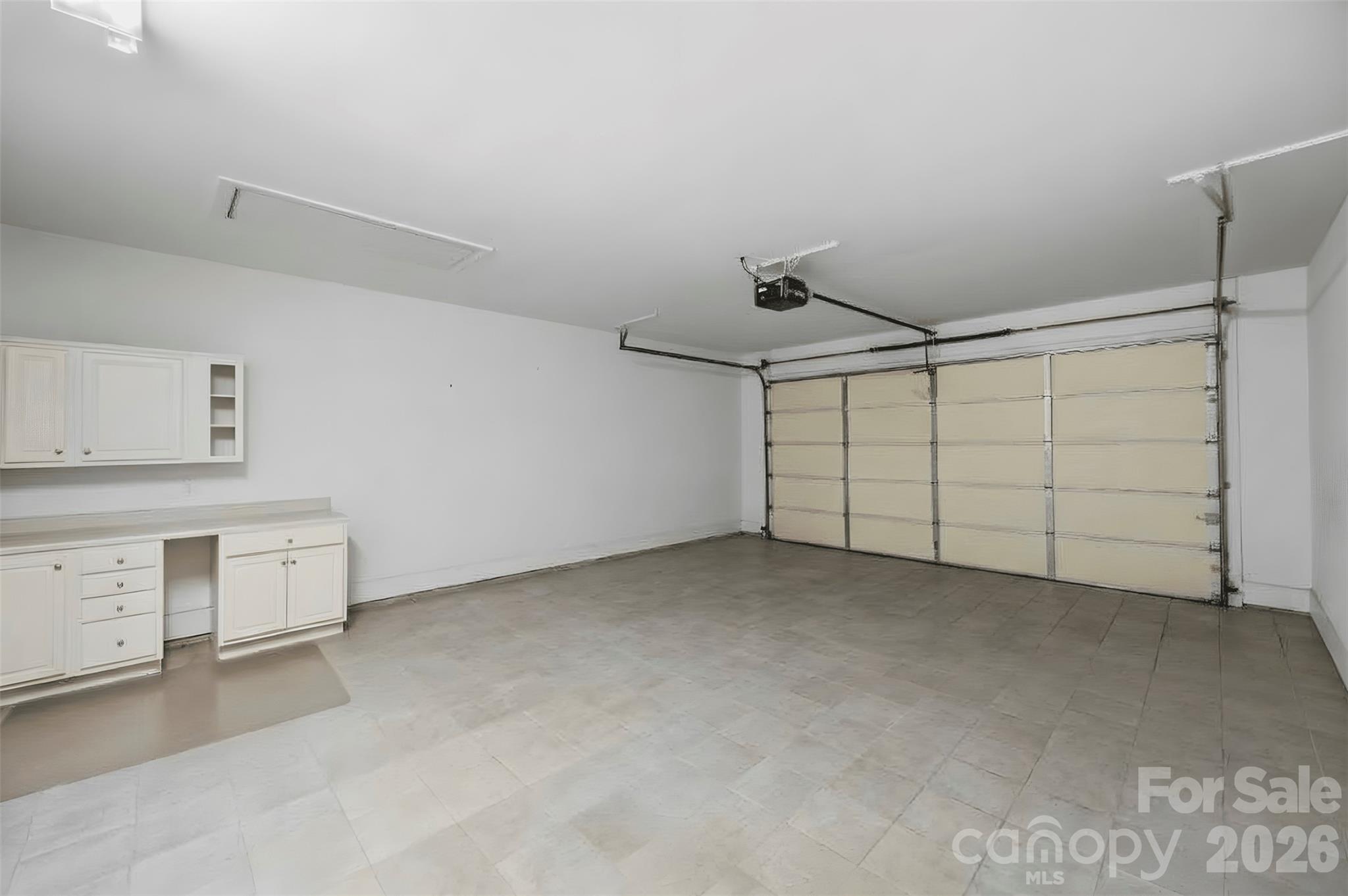 Large tiled two car garage - 8306 Olde Troon Drive, Charlotte