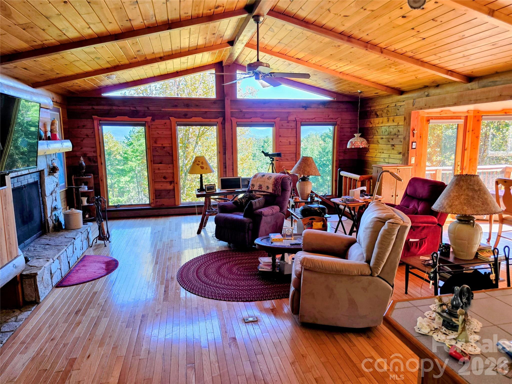Great room showing the vaulted ceiling and rock fireplace - 105 Poplar Ridge Lane, Burnsville