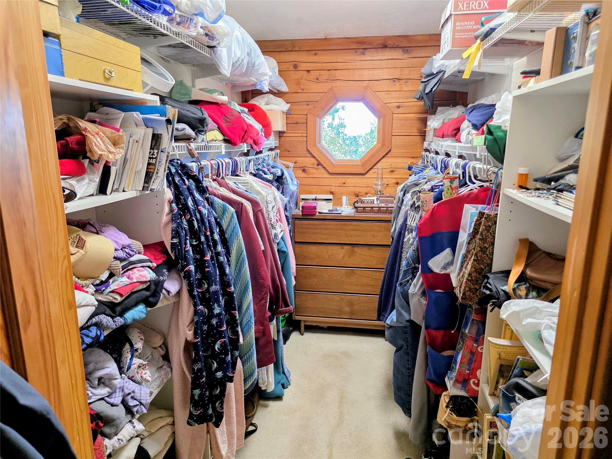 Walk in closet with octagonal window - 105 Poplar Ridge Lane, Burnsville