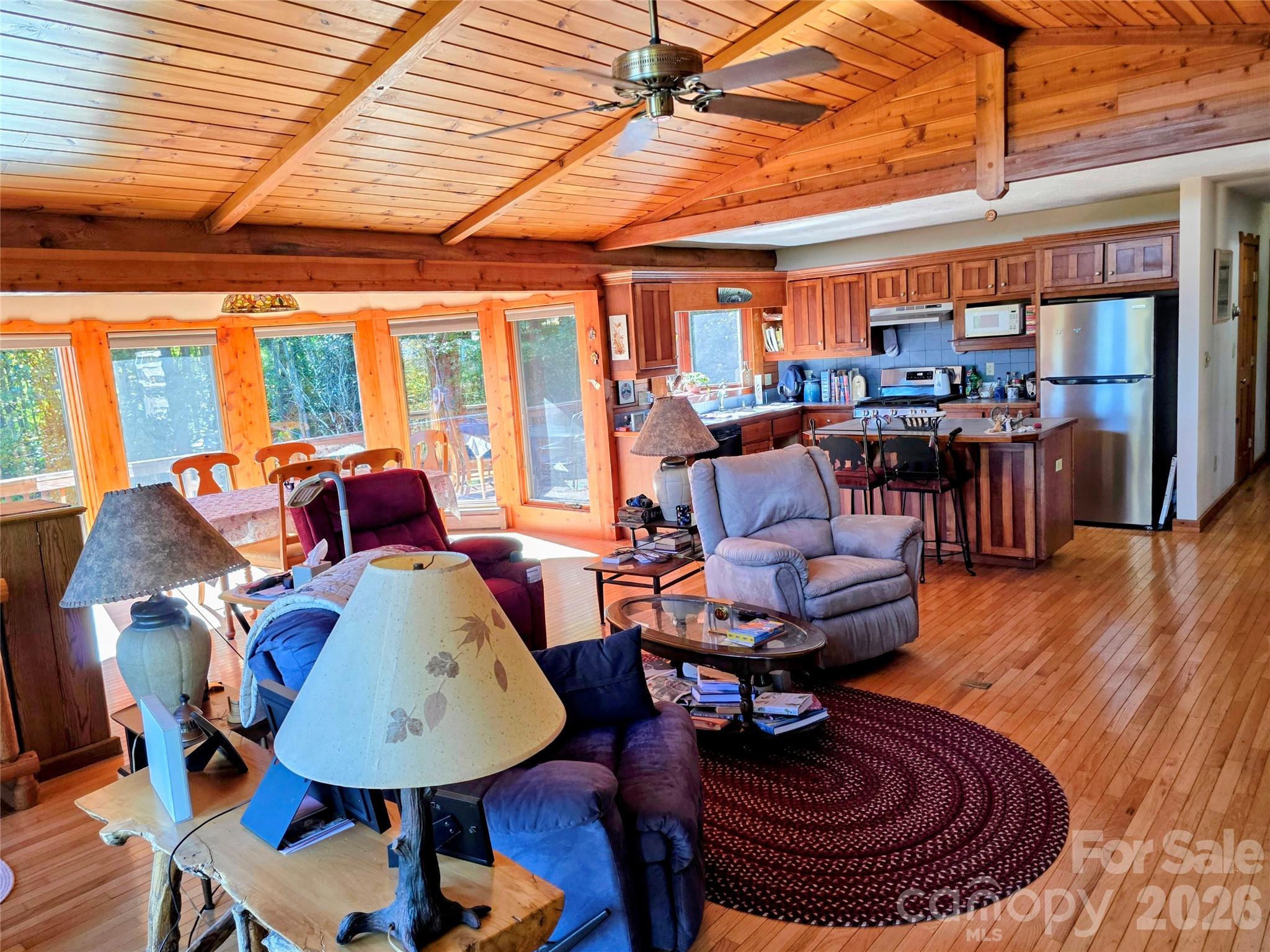 Great room with dining area and kitchen in the background - 105 Poplar Ridge Lane, Burnsville