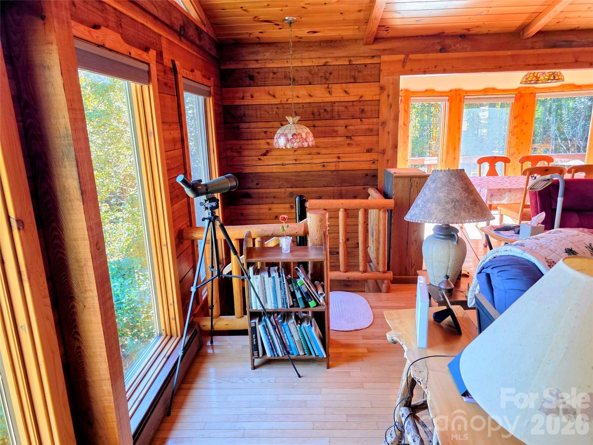 Great room with spiral stairs to the lower level - 105 Poplar Ridge Lane, Burnsville