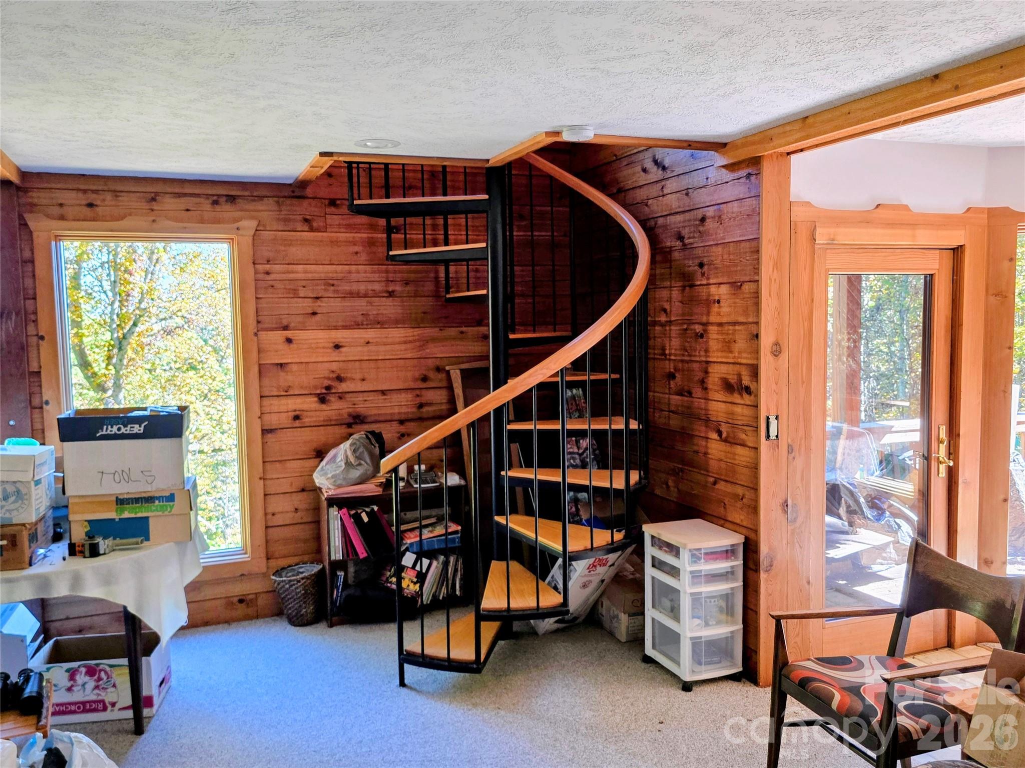 Spiral staircase to the lower level - 105 Poplar Ridge Lane, Burnsville