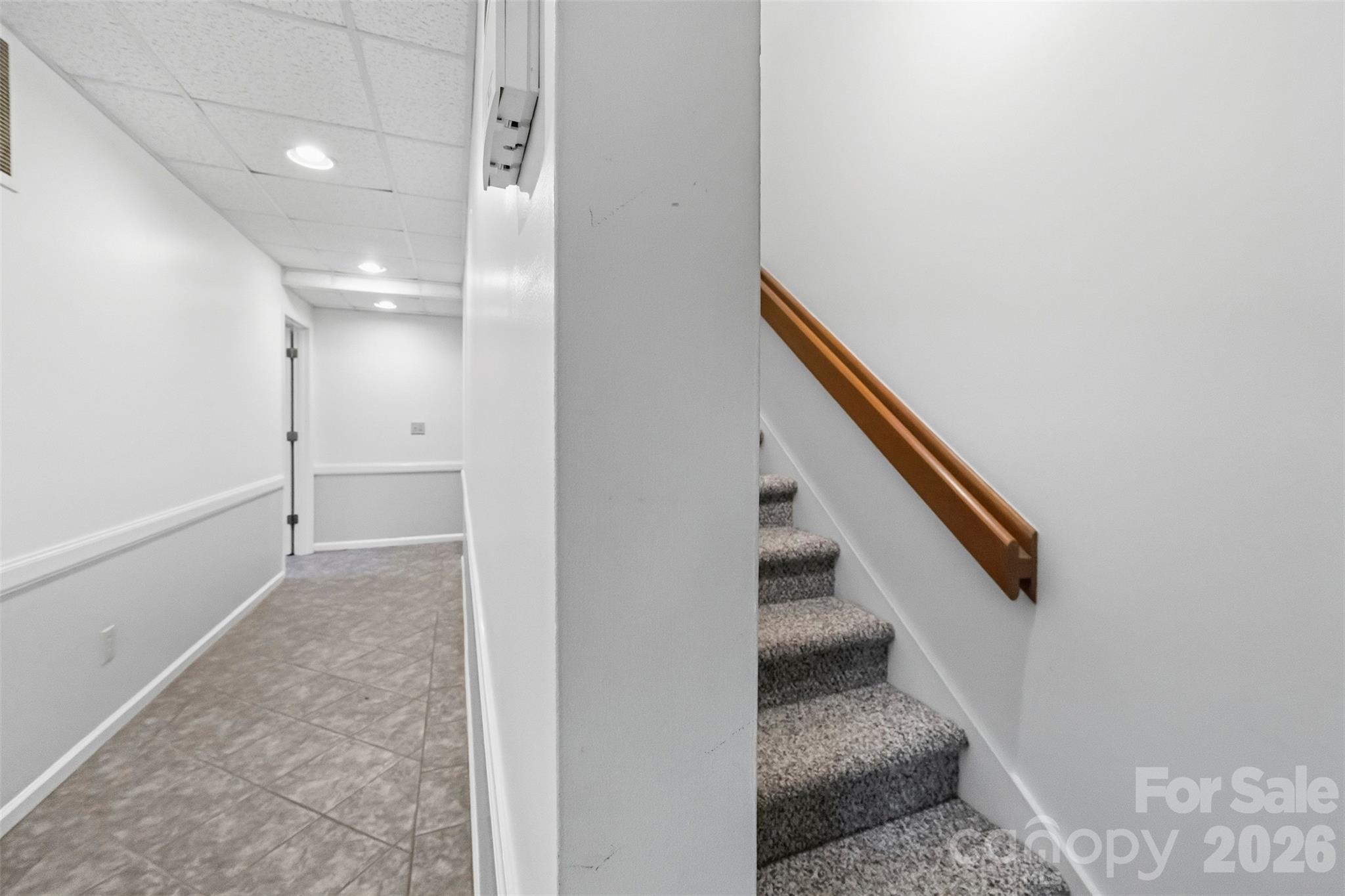 Main staircase leads to the finished basement - 185 Appian Way, Shelby