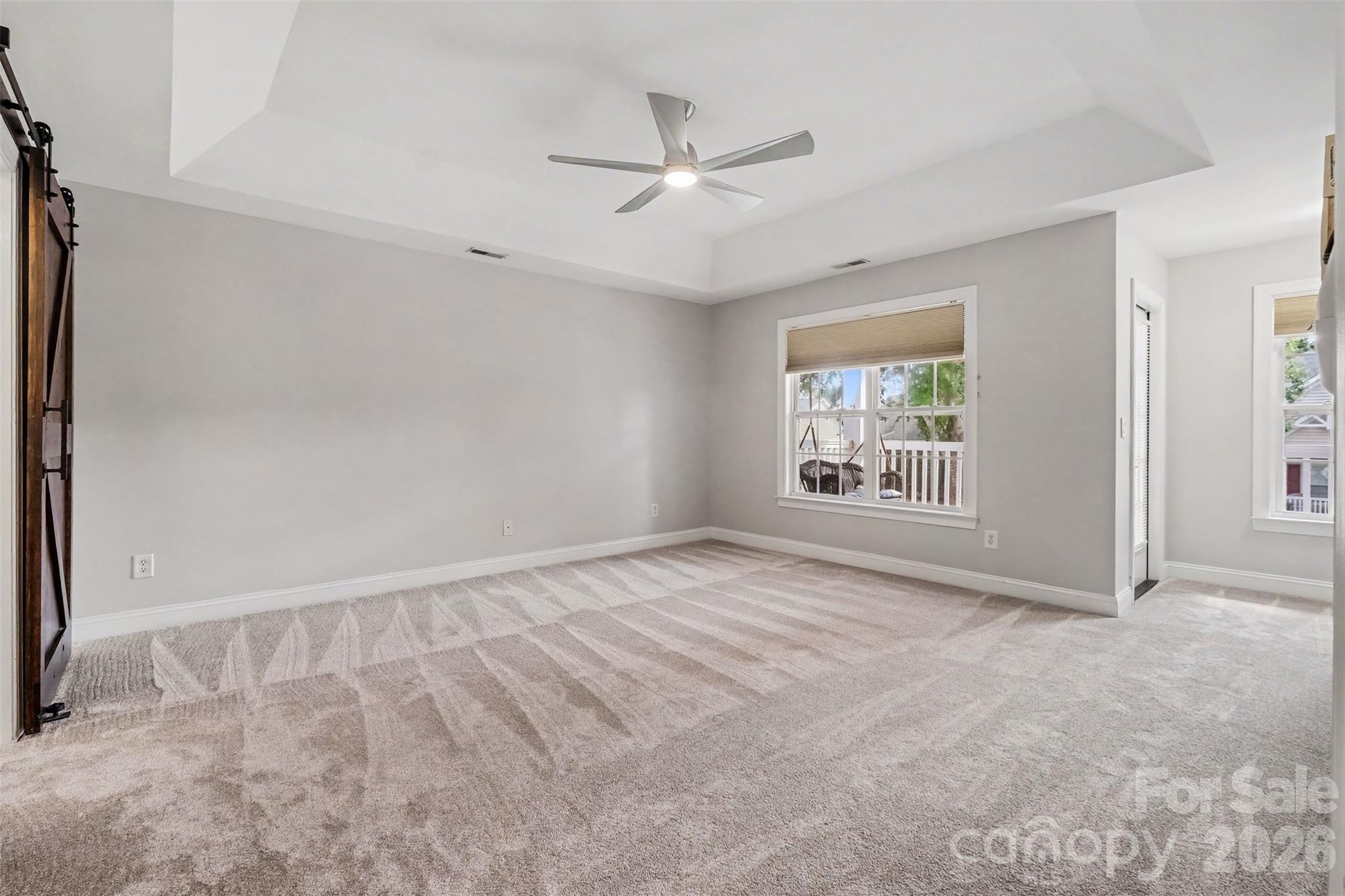 Primary Bedroom offers access to the upper balcony - 1006 Triple Crown Drive, Indian Trail