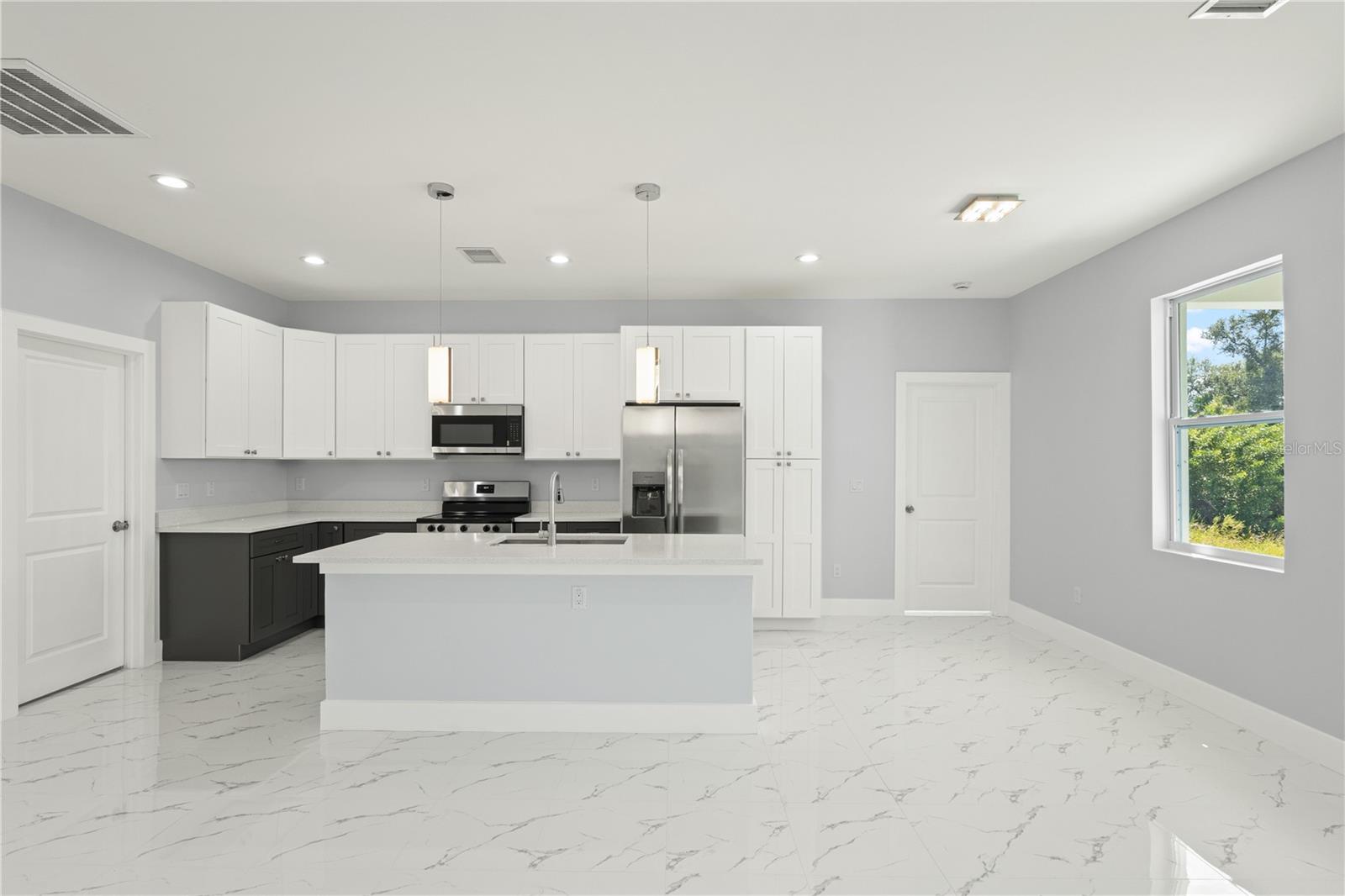 Island kitchen for your family breakfast time! - 12025 CLARENDON AVE, PORT CHARLOTTE