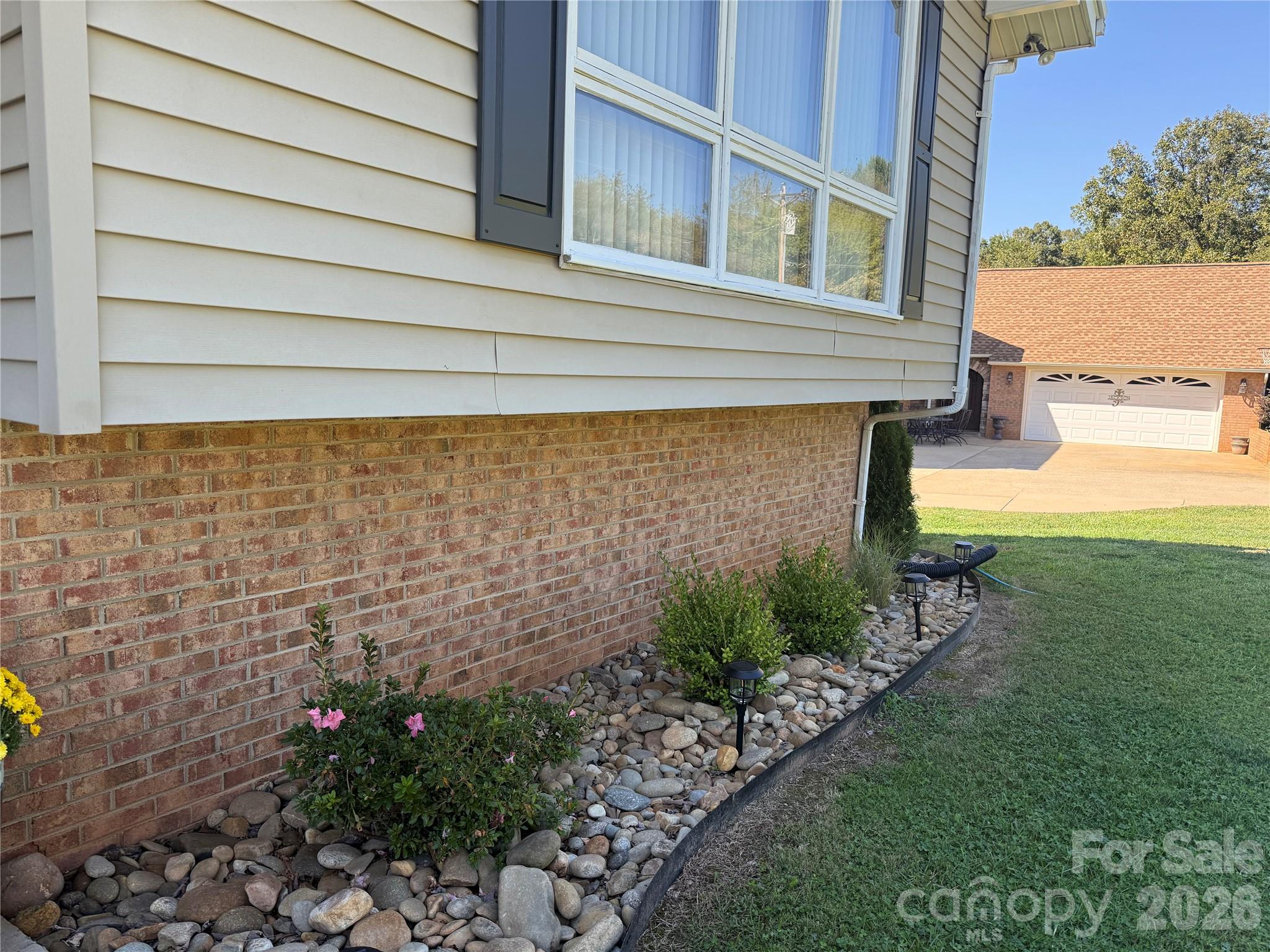 New shrubbery added to the landscaping - 152 North Shore Drive, Cherryville