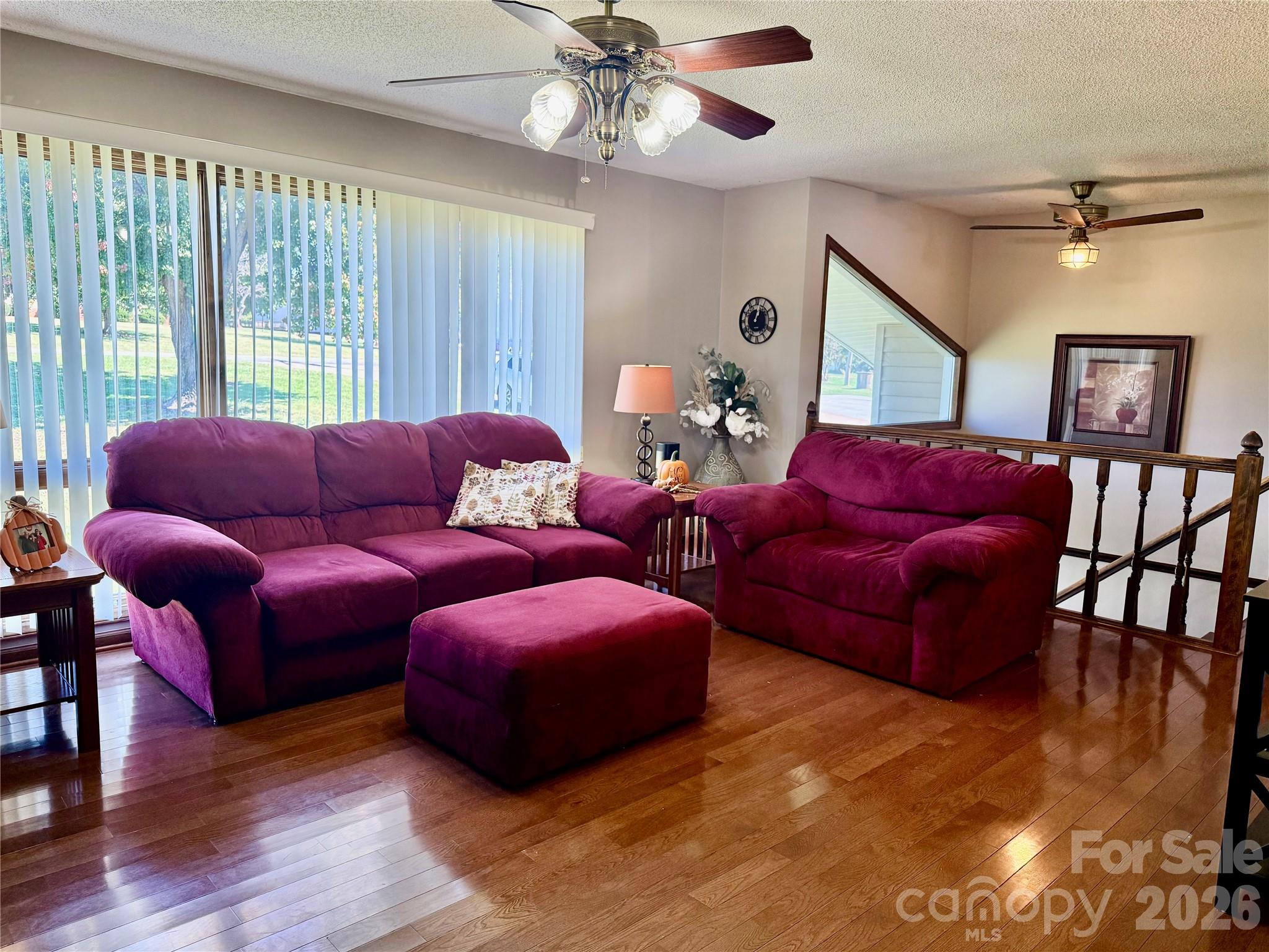 After paint.  Spacious living room with large window and gas log fireplace. - 152 North Shore Drive, Cherryville