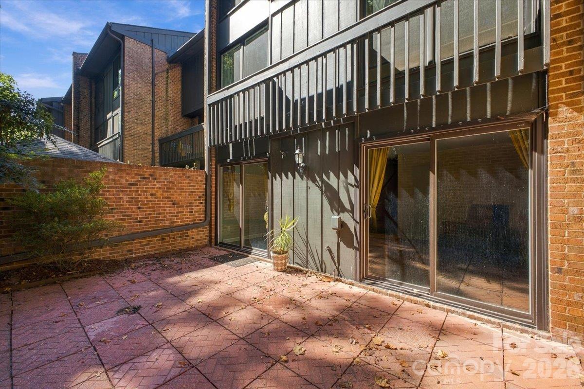 Outdoor patio off basement level with great storage - 5805 Sharon Road, Charlotte