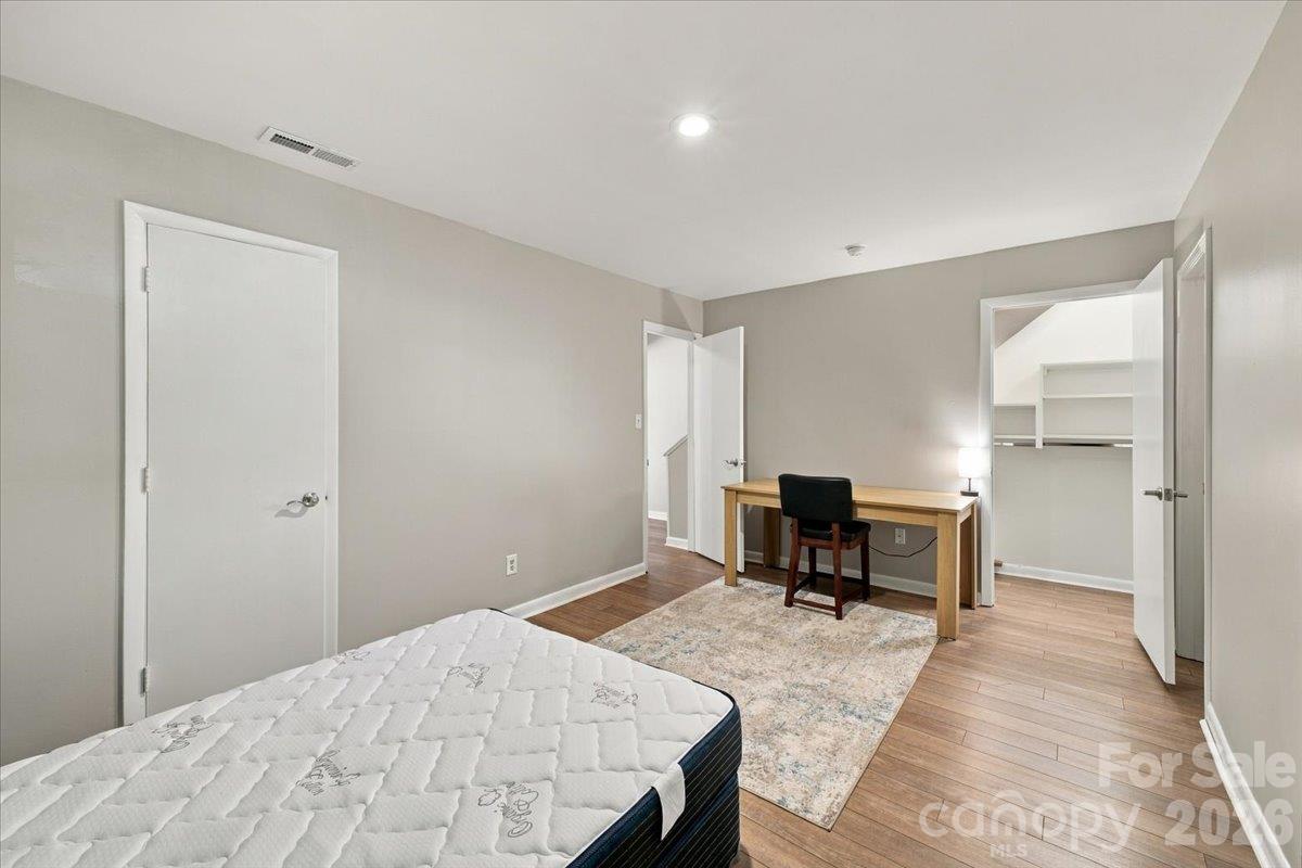 Bedroom on Basement level with ensuite and ample closet and storage - 5805 Sharon Road, Charlotte