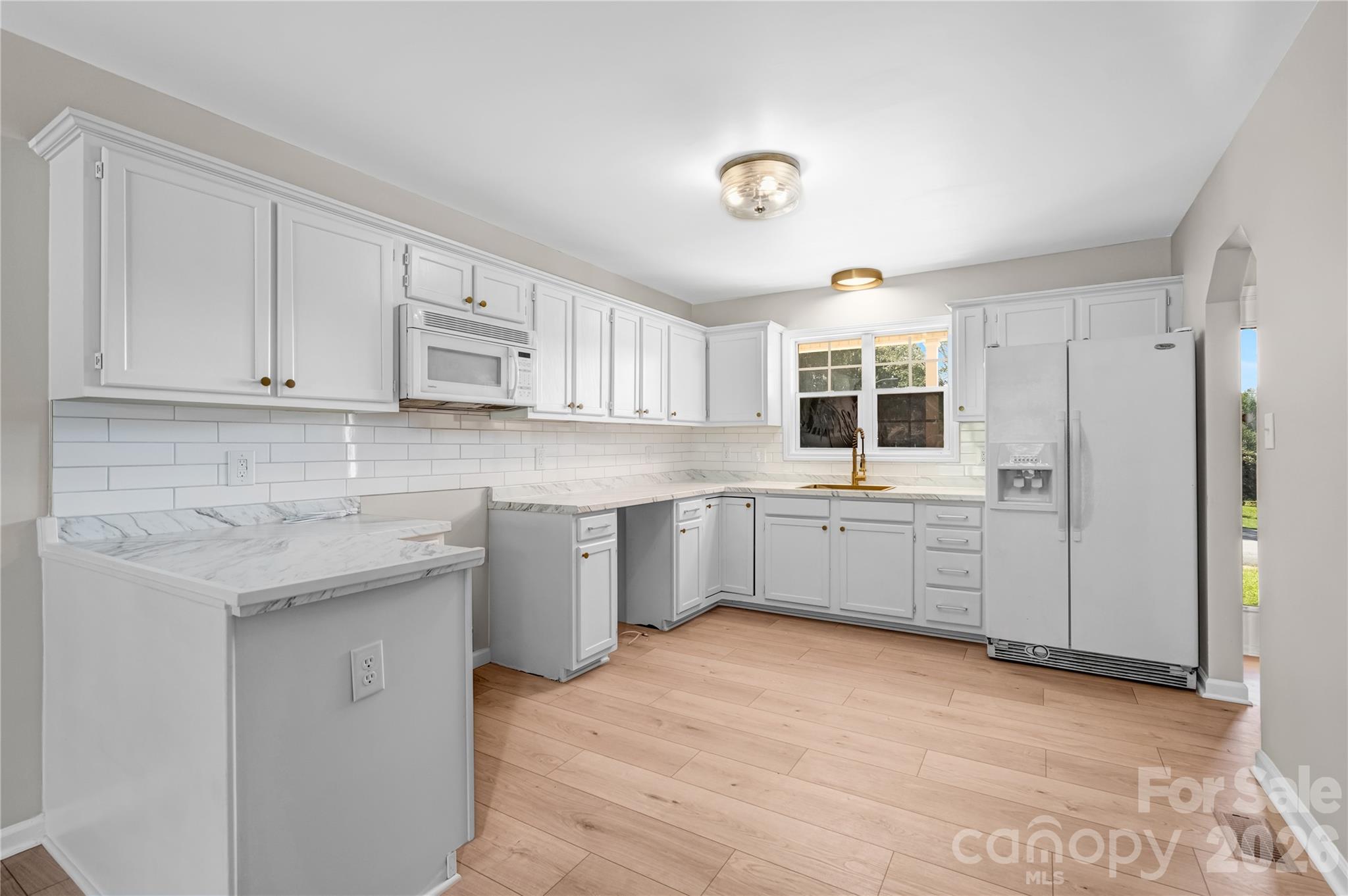 Kitchen3.Shermin Williams Eggshell Ultra White Cabinet colors - 2065 Gary Lane, Hickory