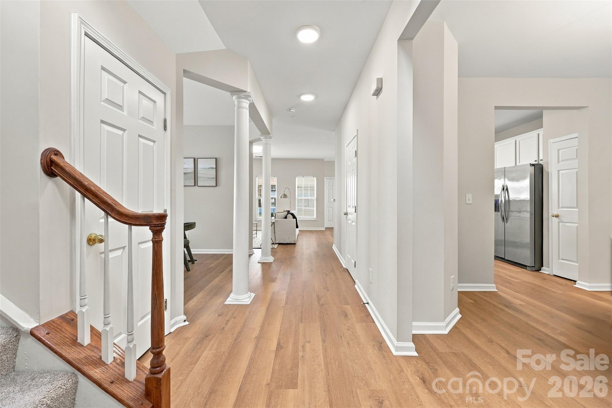 Entrance view showcasing brand new LVP floor on the entire first level - 11705 Kingsley View Drive, Charlotte
