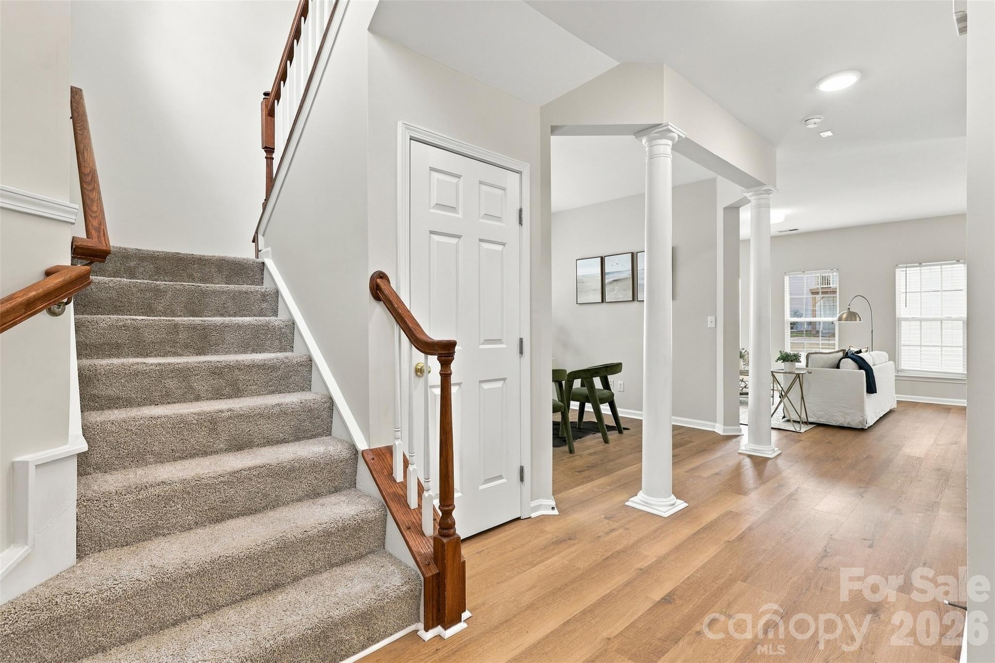 Staircase to upper level - 11705 Kingsley View Drive, Charlotte