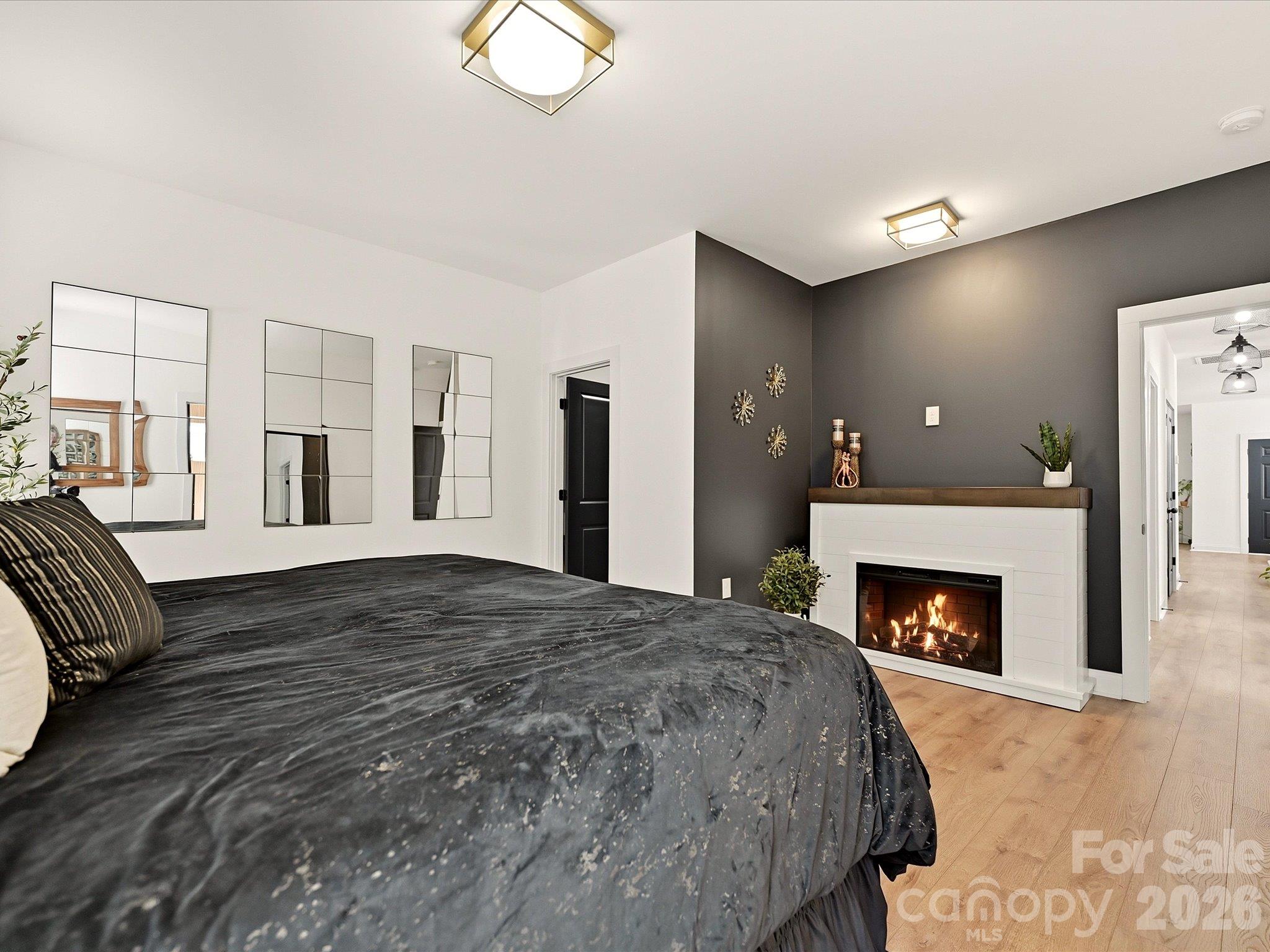 Luxury primary bedroom with accent walls - 914 Flint Street Extension, Rock Hill