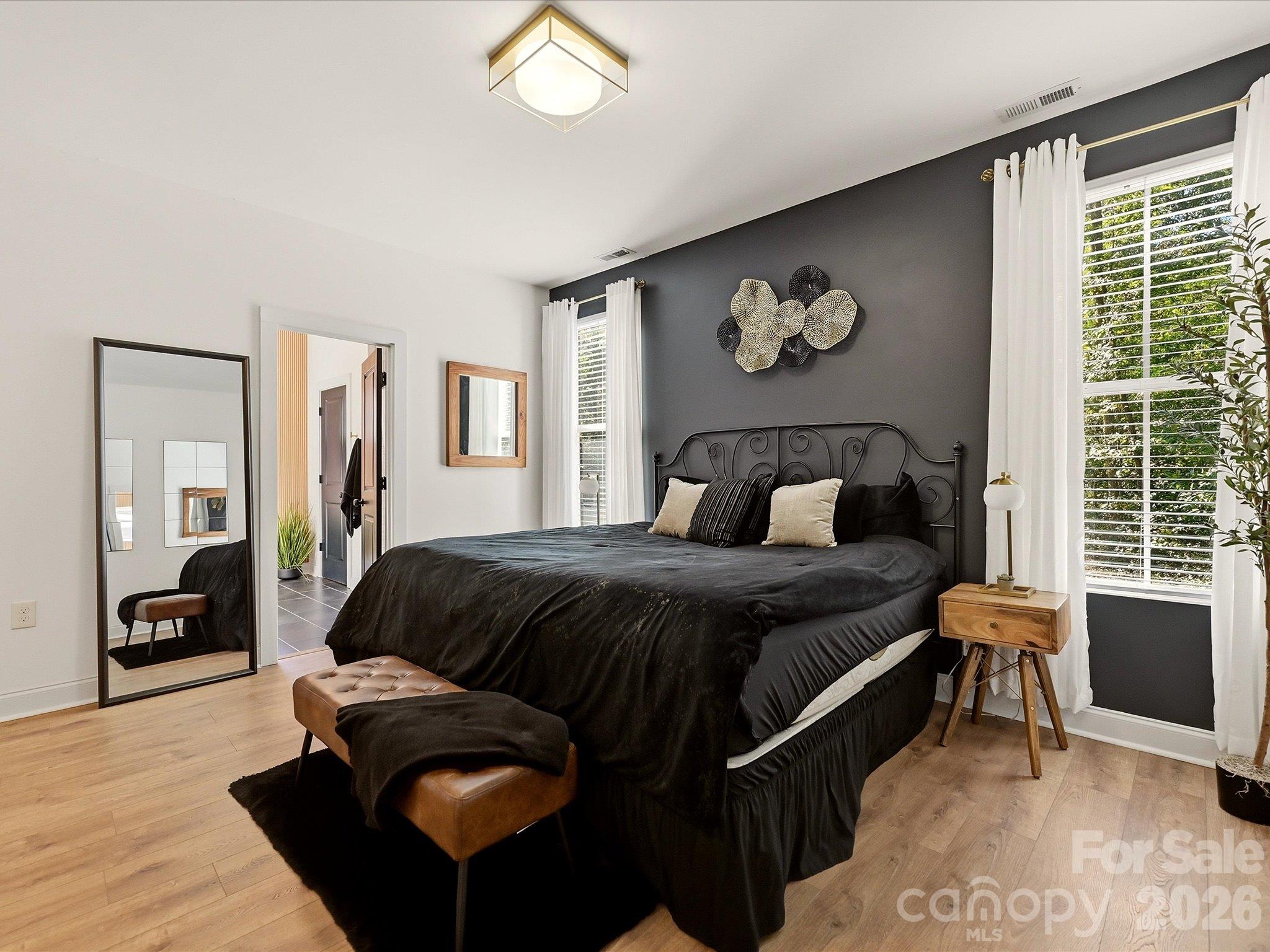 Luxury primary bedroom with accent walls - 914 Flint Street Extension, Rock Hill