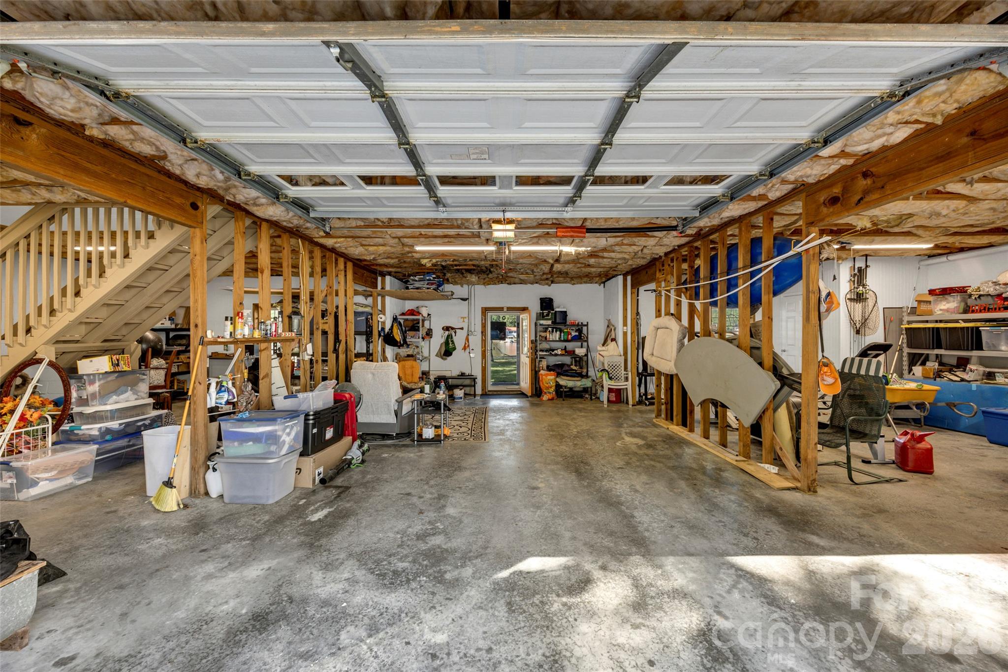 Garage with lots of storage. Has Heat/Air and half bath - 1960 White Road, Camden