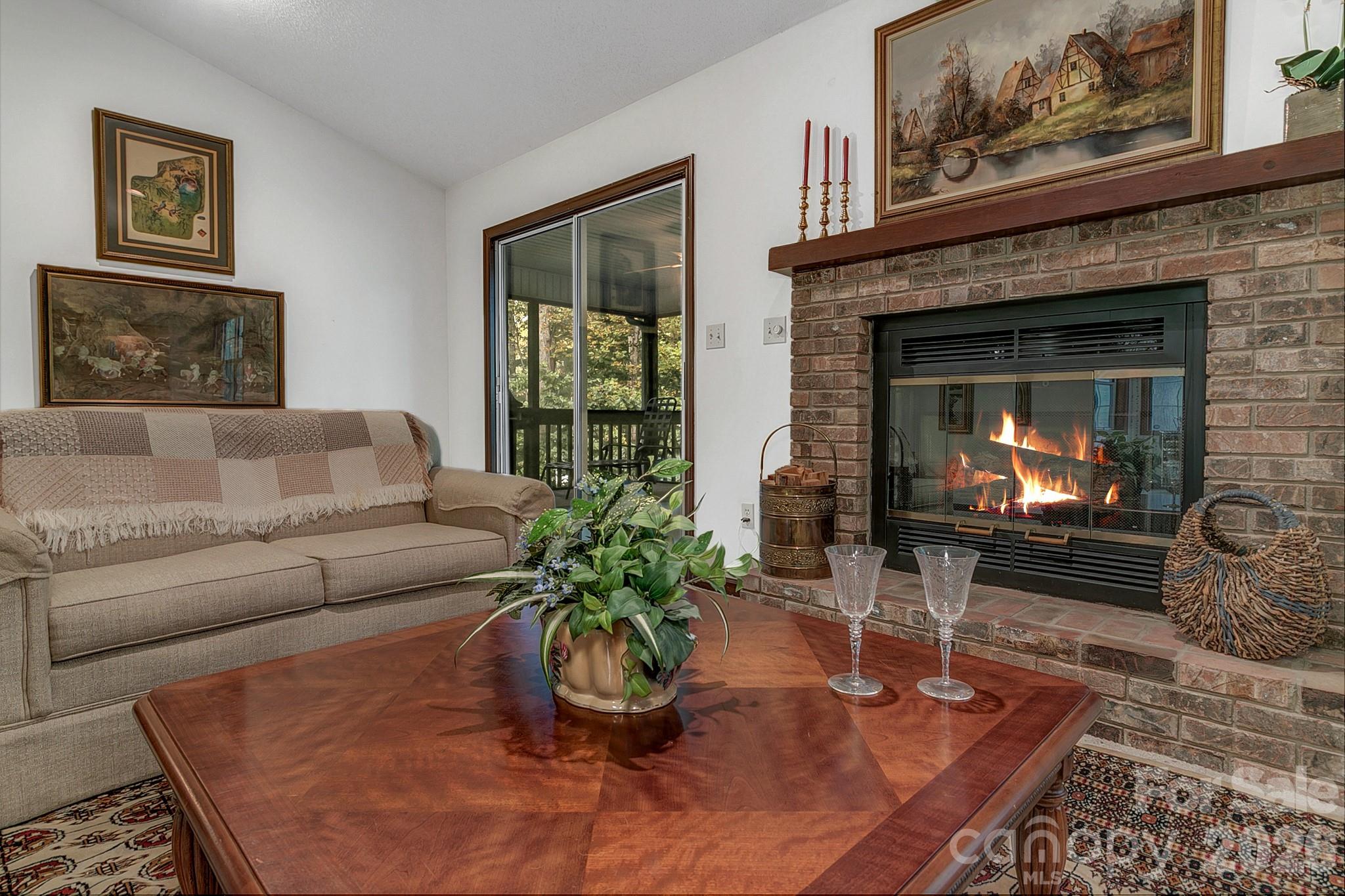 Large living room with vaulted ceilings and a gas fire place - 3111 Essex Path, Hendersonville