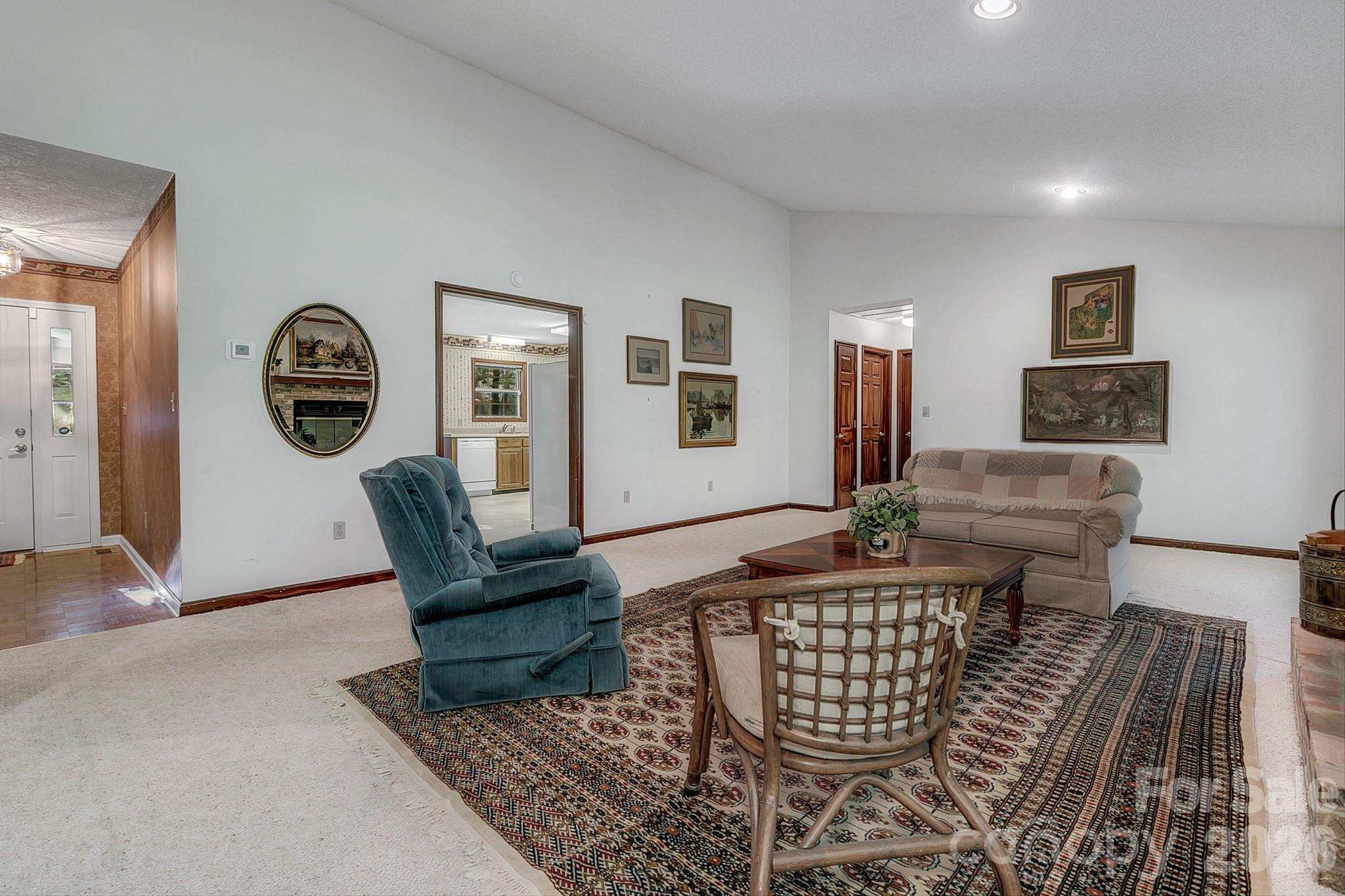 Large living room with vaulted ceilings and a gas fire place - 3111 Essex Path, Hendersonville