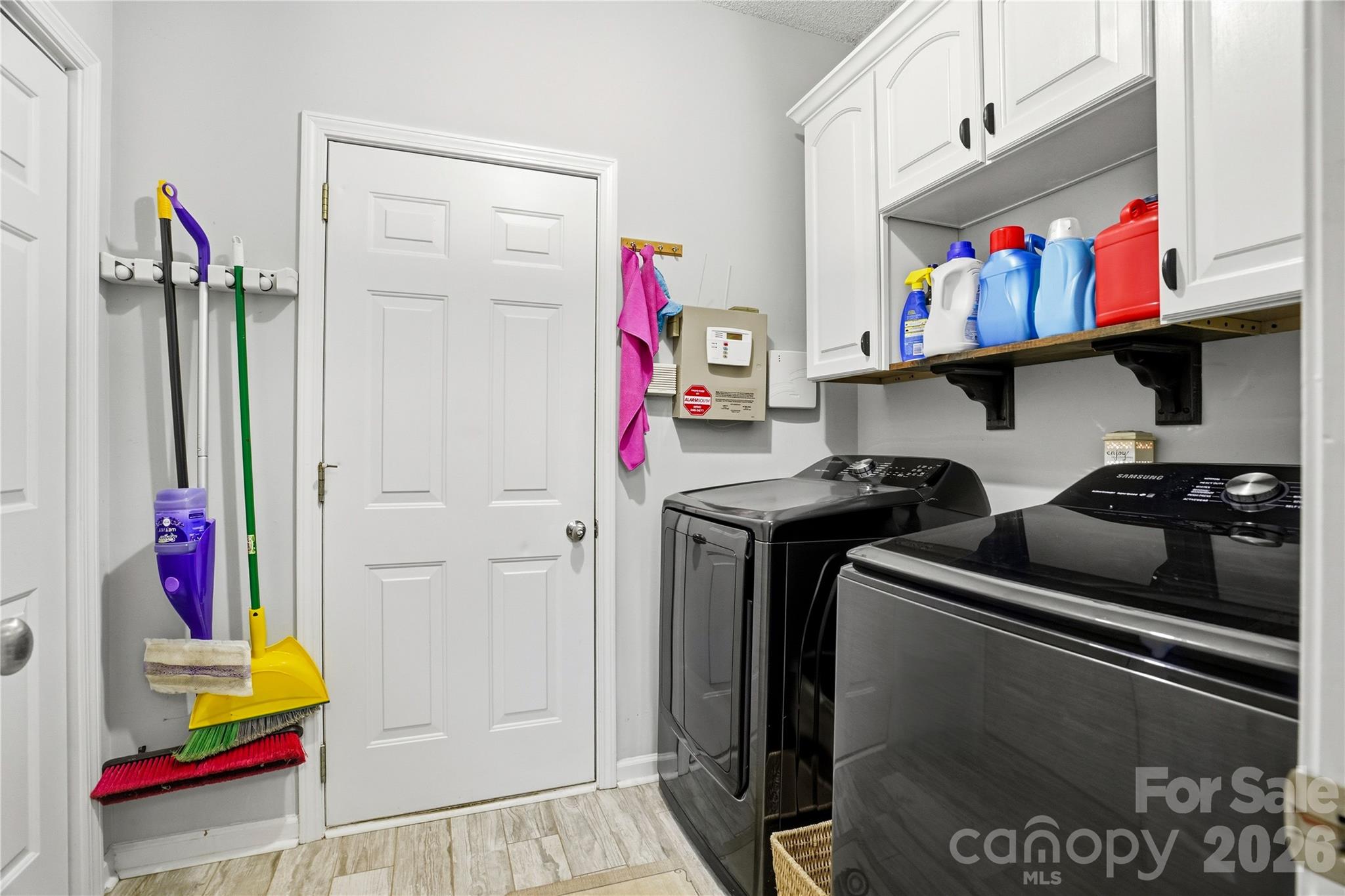 Laundry room with access to garage - 119 Shining Armor Court, Mooresville