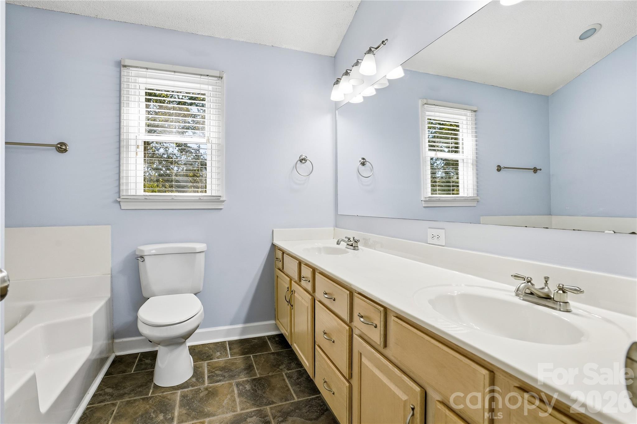 Spacious primary bath with dual sinks - 119 Shining Armor Court, Mooresville