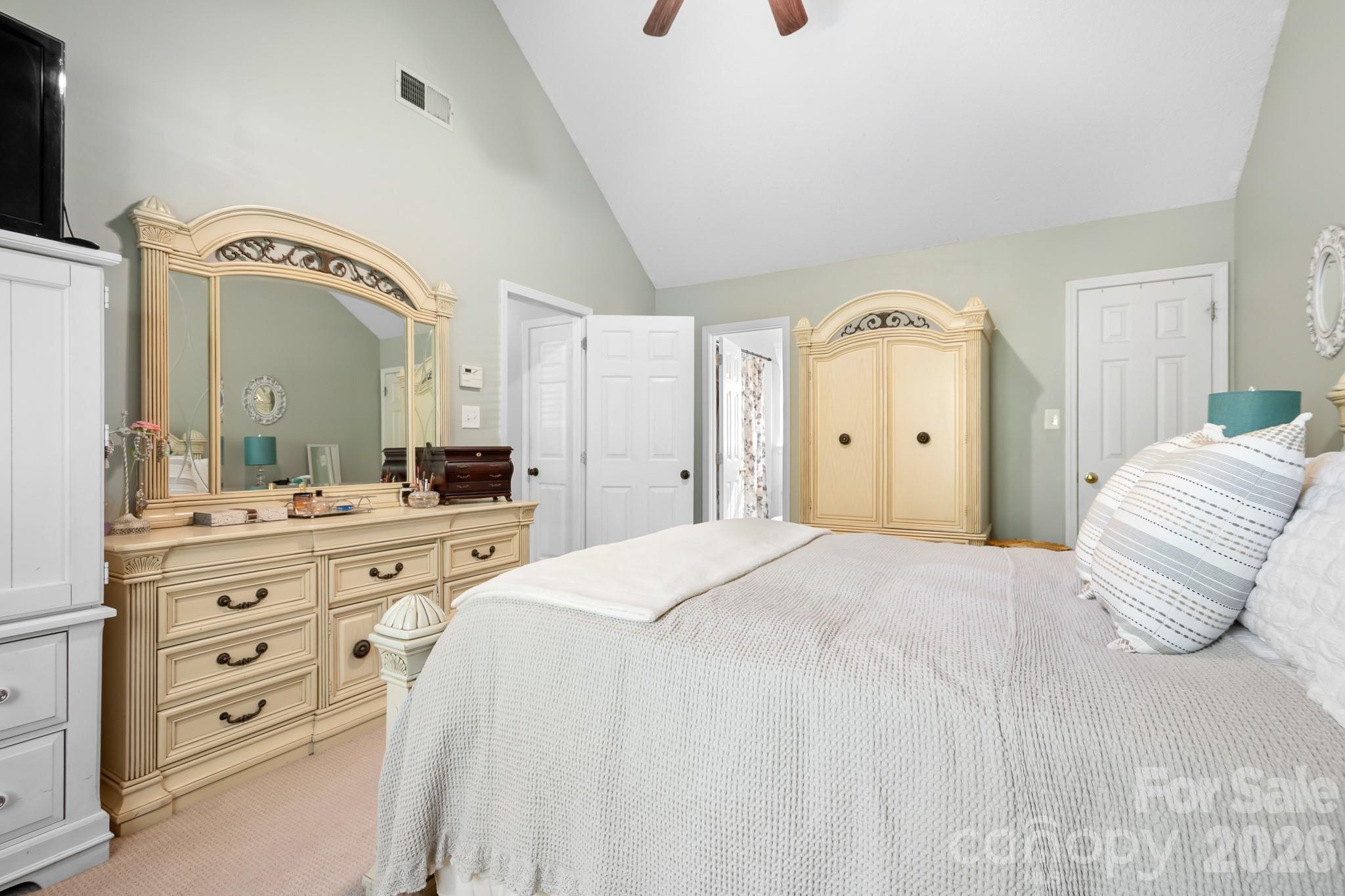Primary Bedrom with Soaring Vaulted Ceilings and Ceiling Fan! Walk In Closet, Primary Full bathroom with Large Soaking Tub! - 4126 Medford Drive NW, Concord