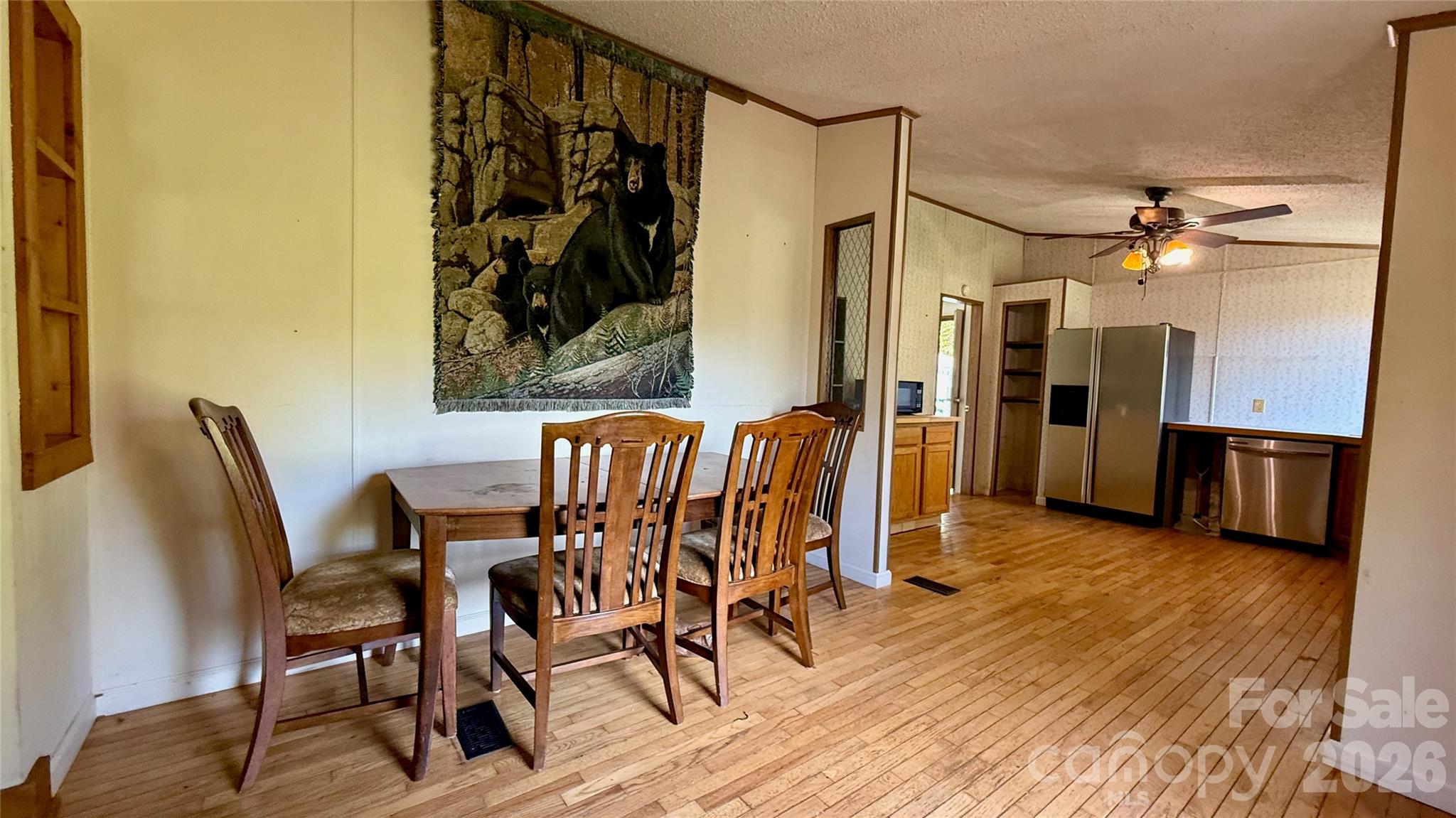 Looking from the dining area into the kitchen. - 898 Rock Creek Road, Burnsville