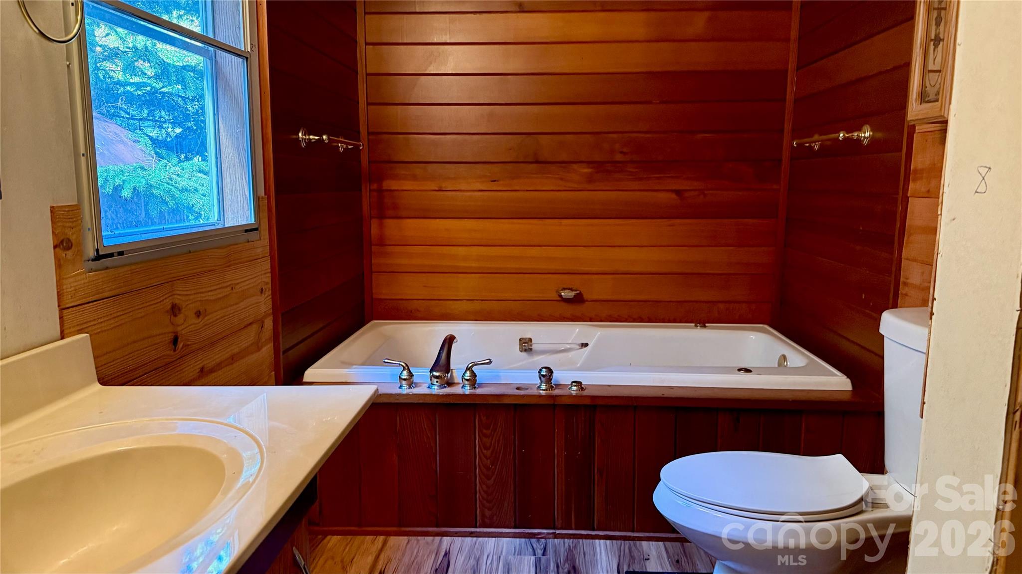 Primary bathroom with jetted tub - 898 Rock Creek Road, Burnsville