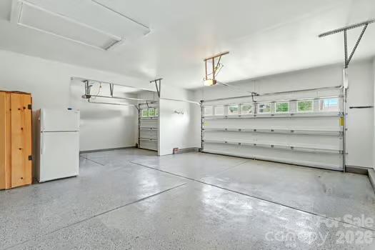 Finished 3 car garage with epoxy floor - 3120 Oliver Stanley Trail, Lancaster