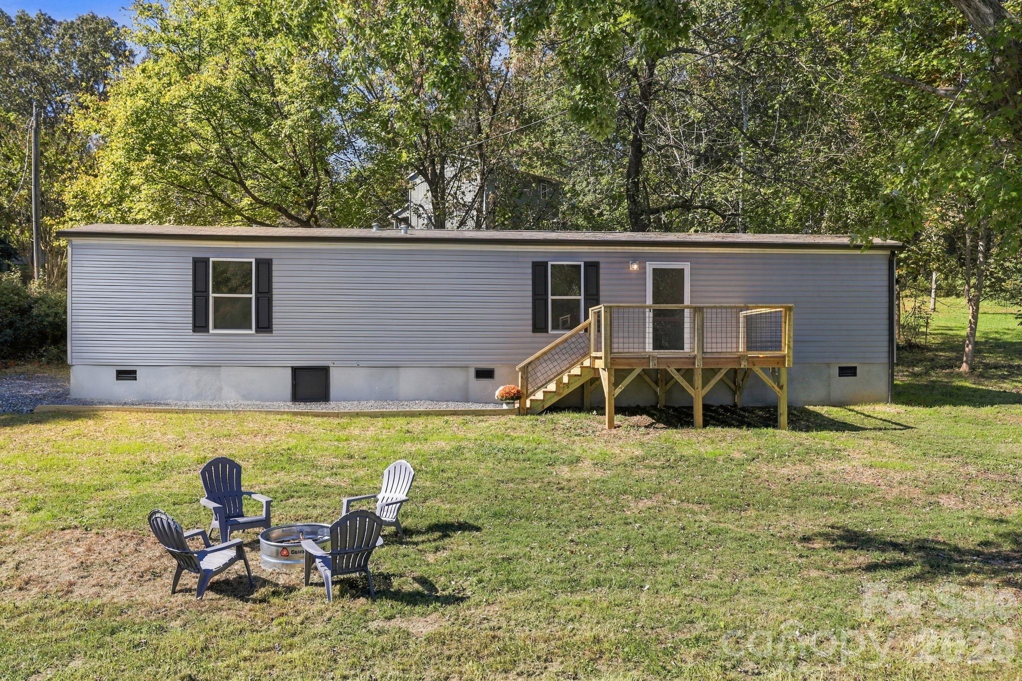 Great yard! Easy low maintenance. Room to add garden beds if that's your jam! - 85 Trent Road, Brevard