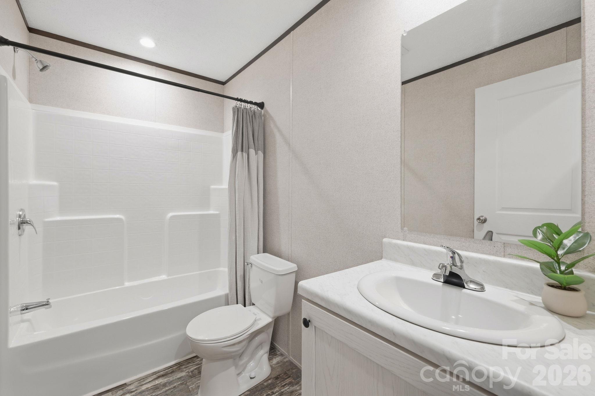 Bath 2 offers a shower/tub combo. - 85 Trent Road, Brevard