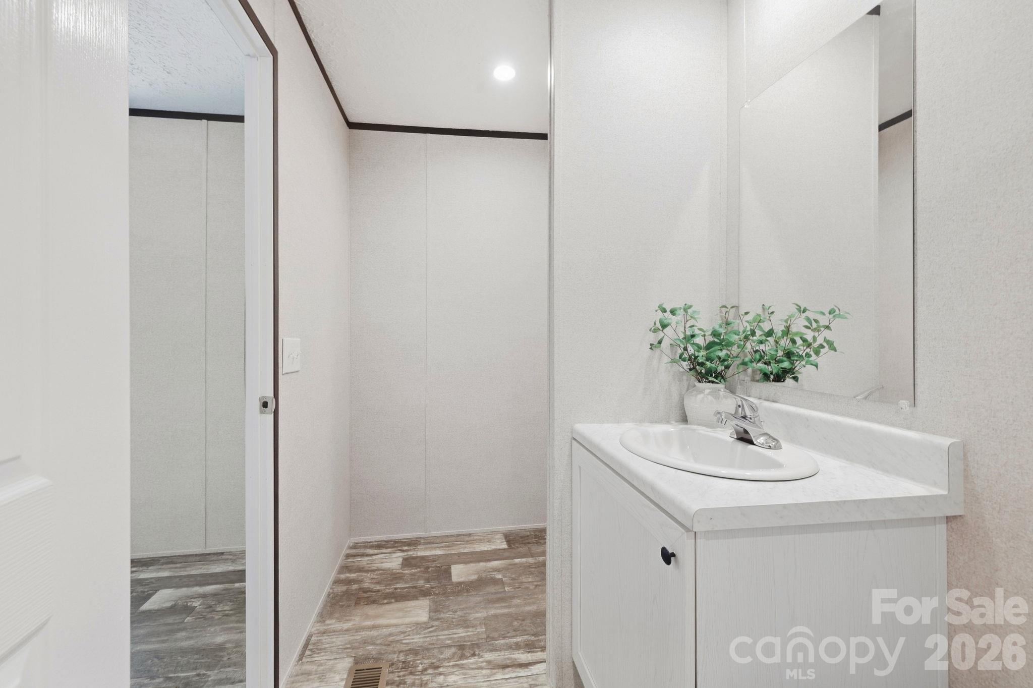 Primary bath offers a owners closet. - 85 Trent Road, Brevard