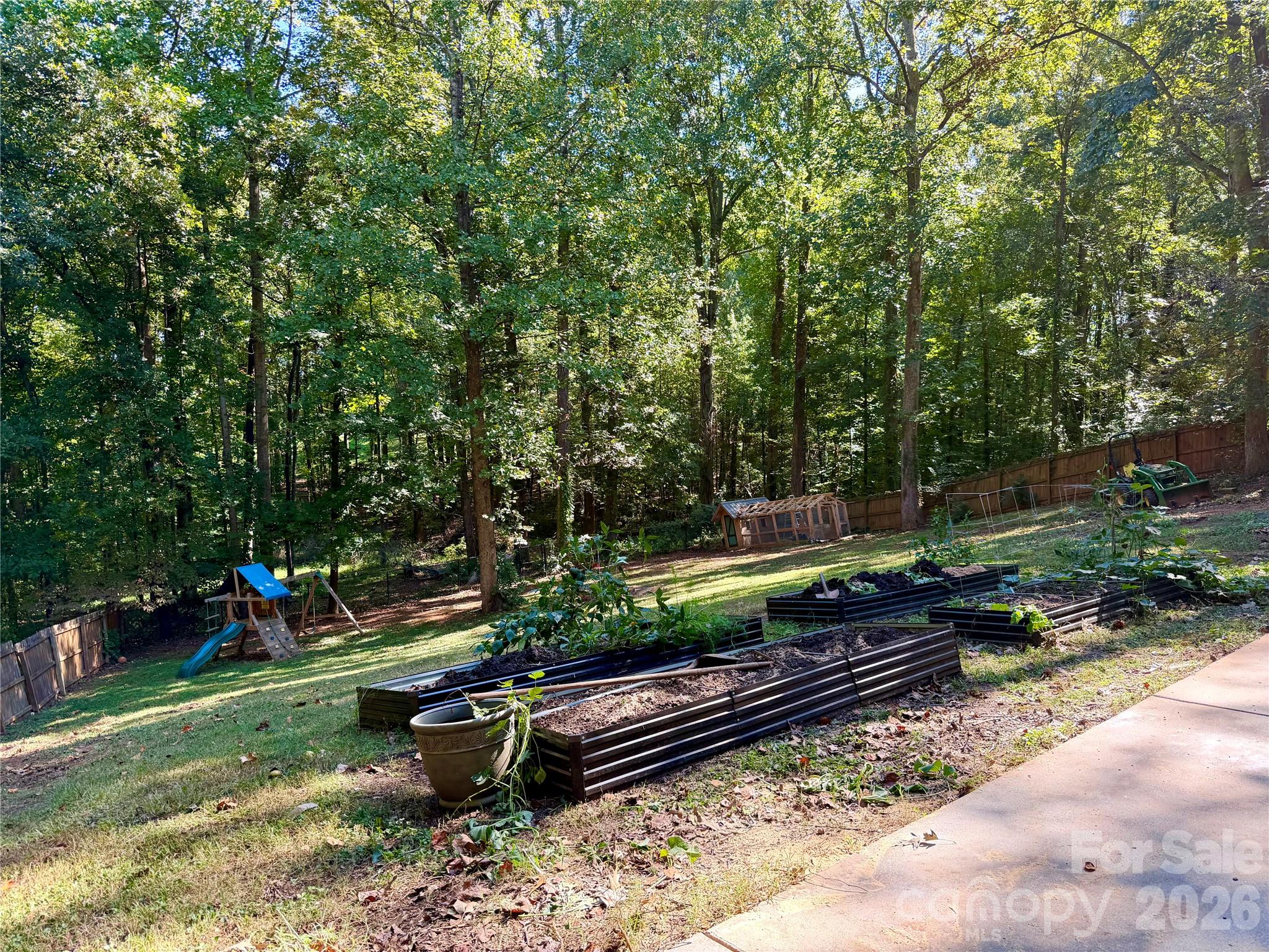 backyard flower beds - 129 Big Oak Lane, Statesville