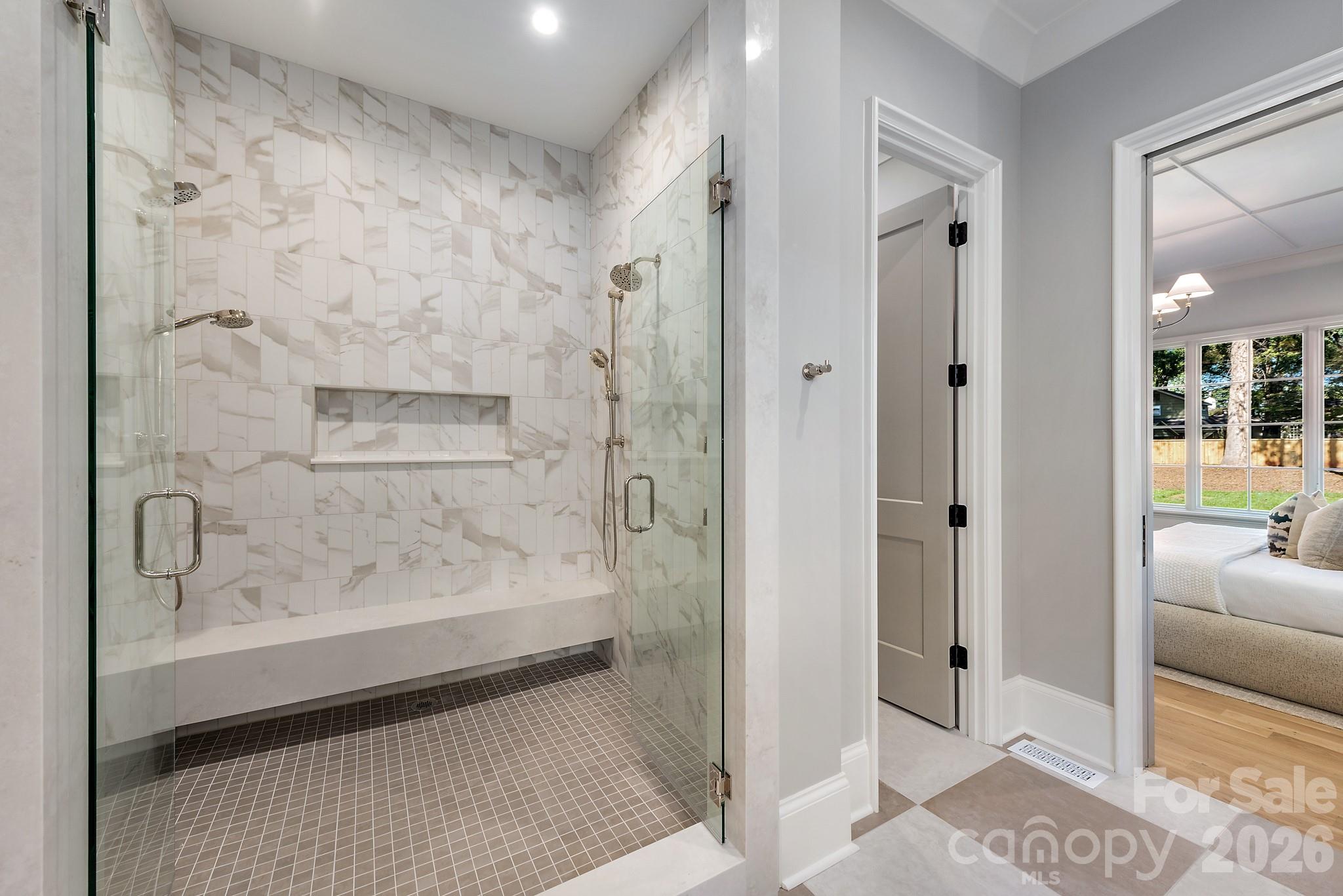 Main level primary suite. - 133 Wonderwood Drive, Charlotte