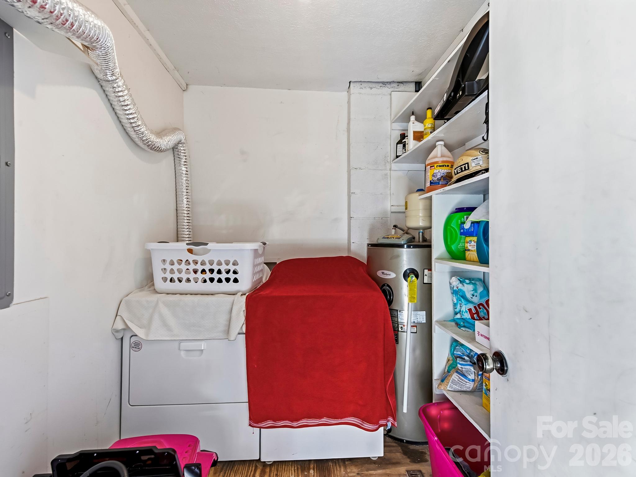 Laundry room located in carport for each unit. - 17 Randolph Avenue, Flat Rock