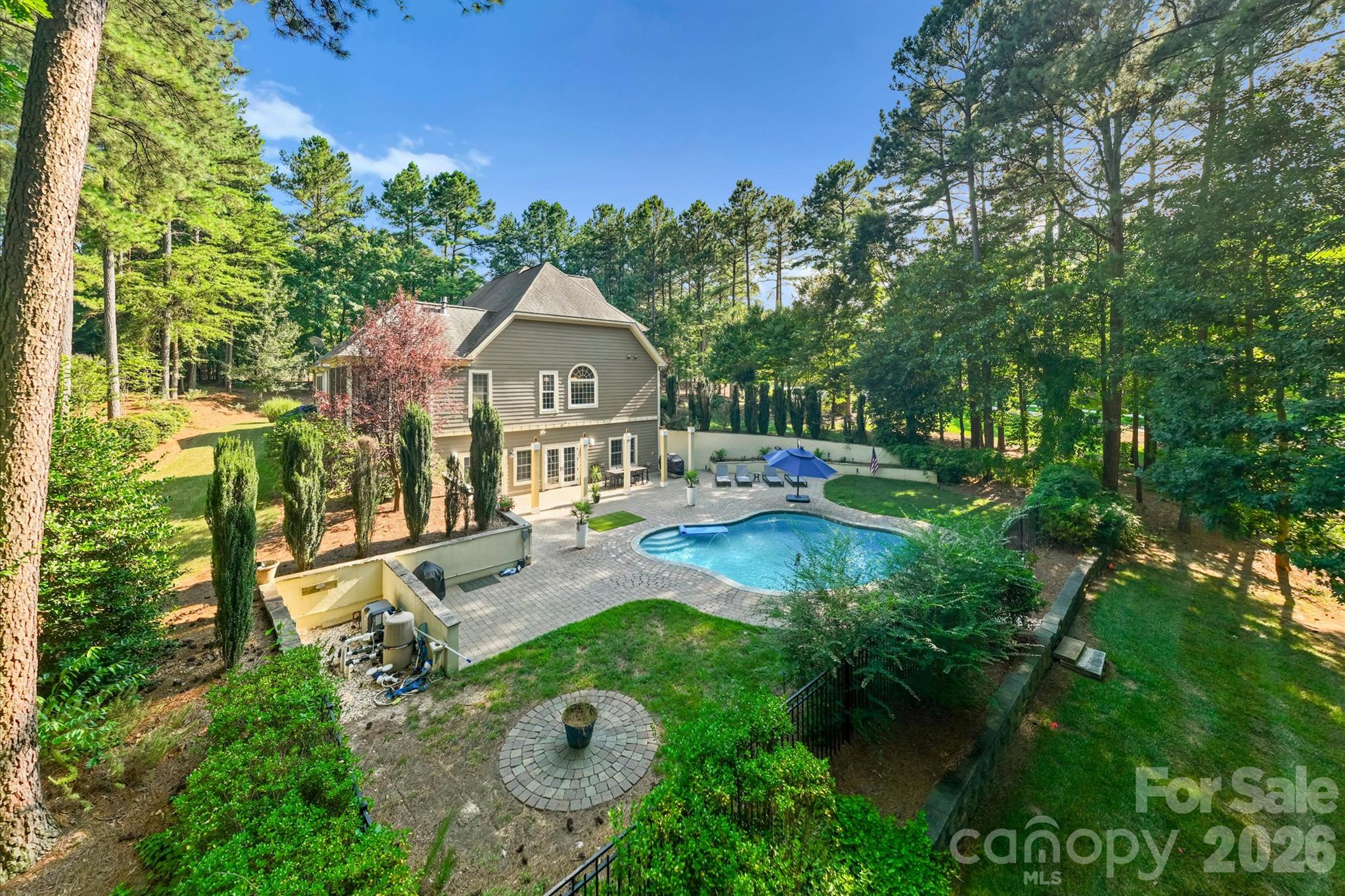 Back exterior with private heated saltwater pool - 4552 Sawgrass Court, Denver