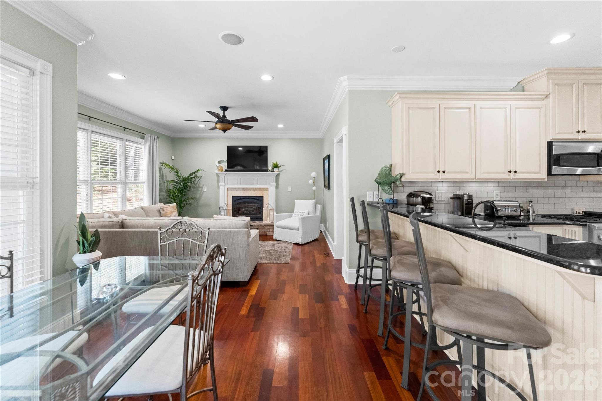 Kitchen, breakfast nook and sitting room - 4552 Sawgrass Court, Denver