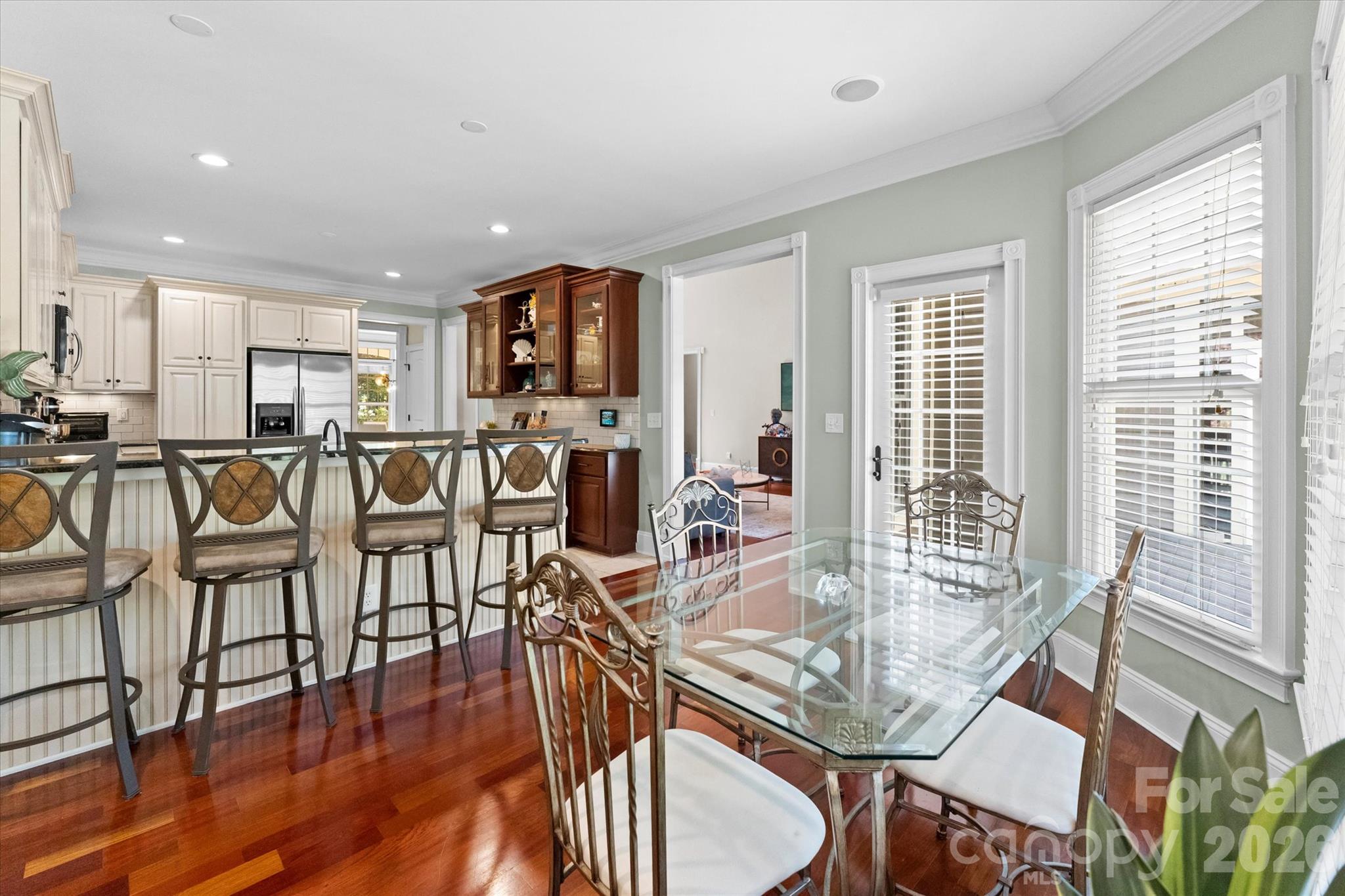Kitchen and breakfast nook - 4552 Sawgrass Court, Denver
