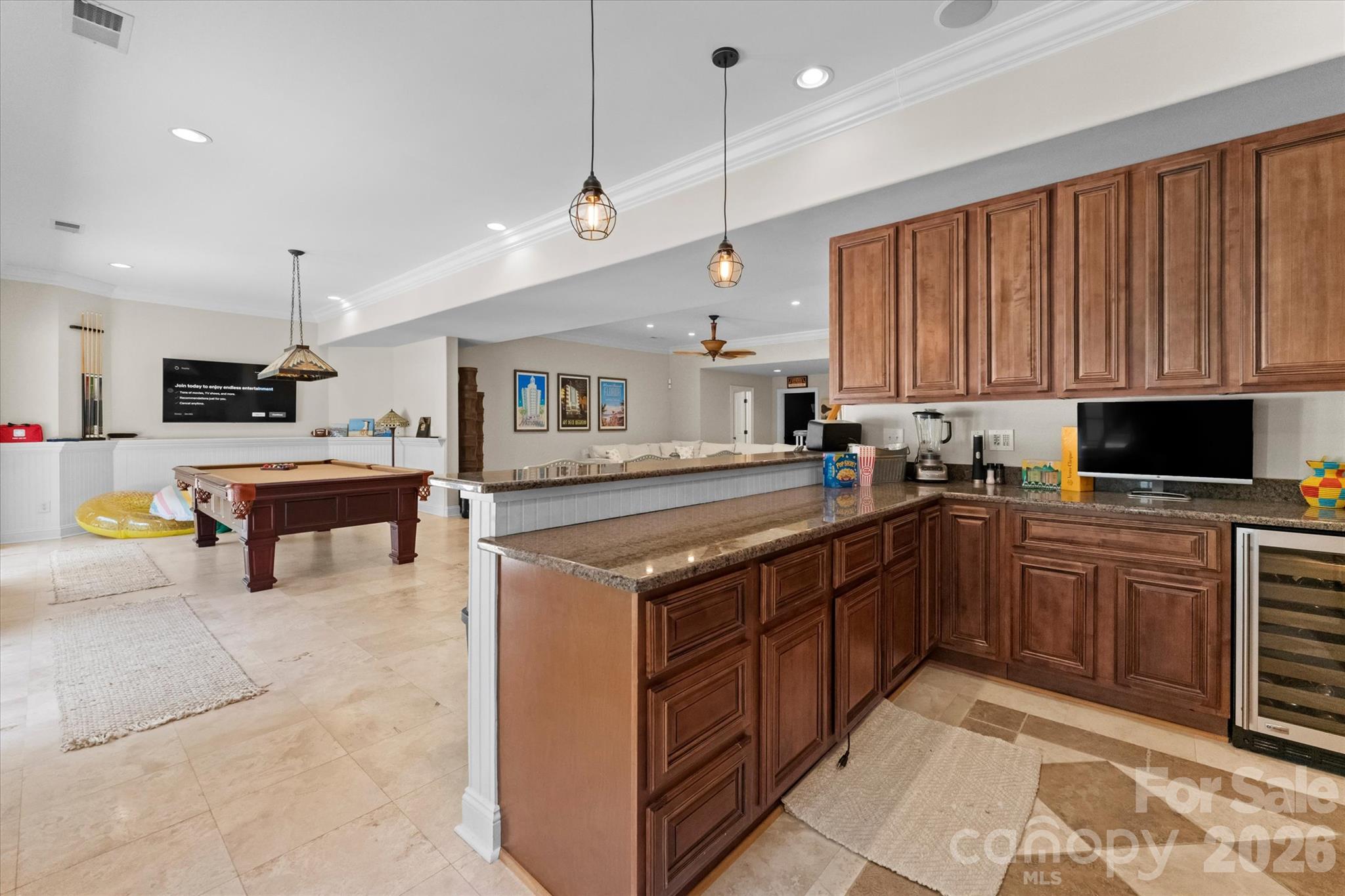 Basement kitchen into billiards room and living room - 4552 Sawgrass Court, Denver