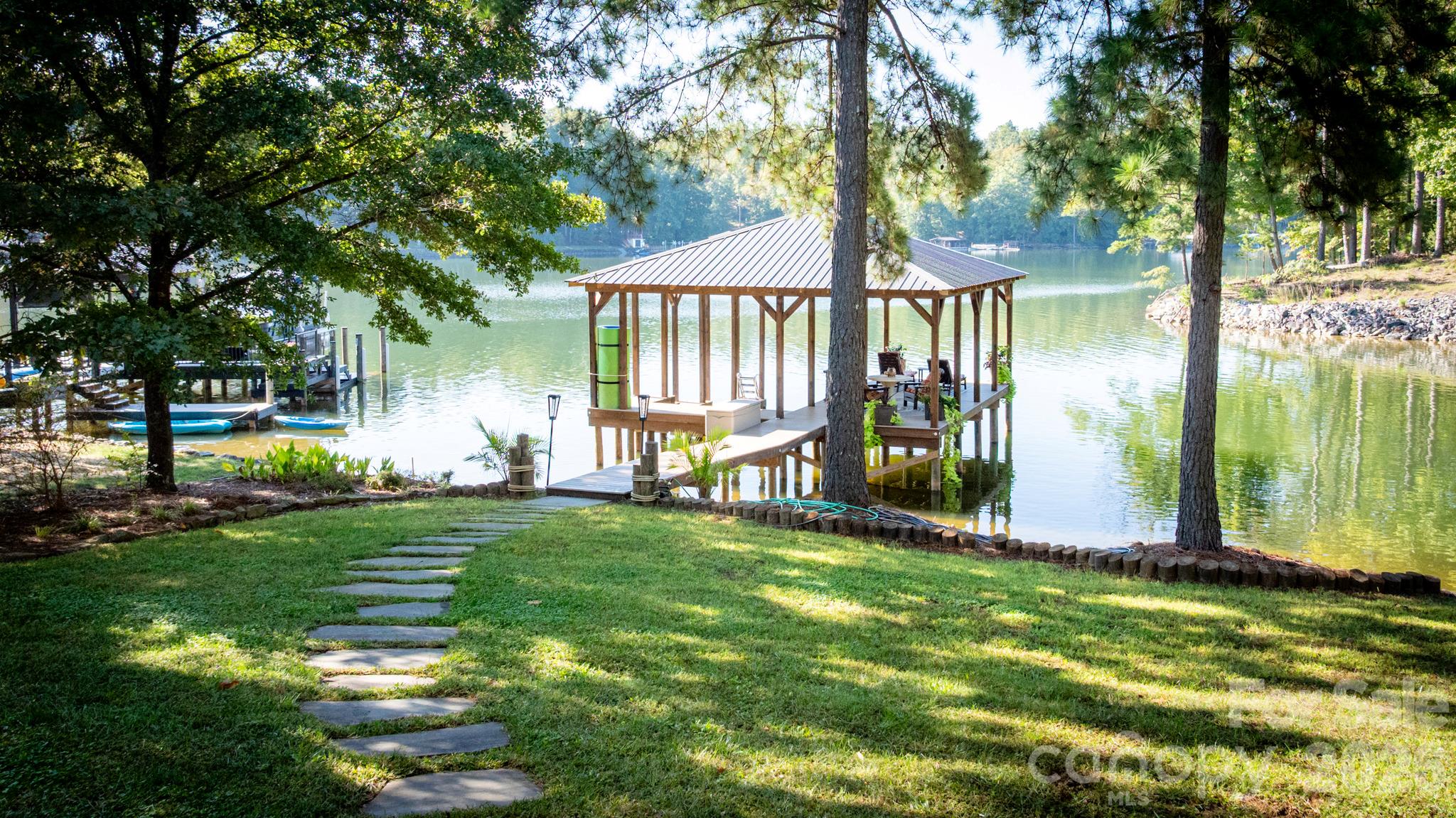 The stabalized & covered dock features year-round deep water - 1285 Saunders Drive, Catawba