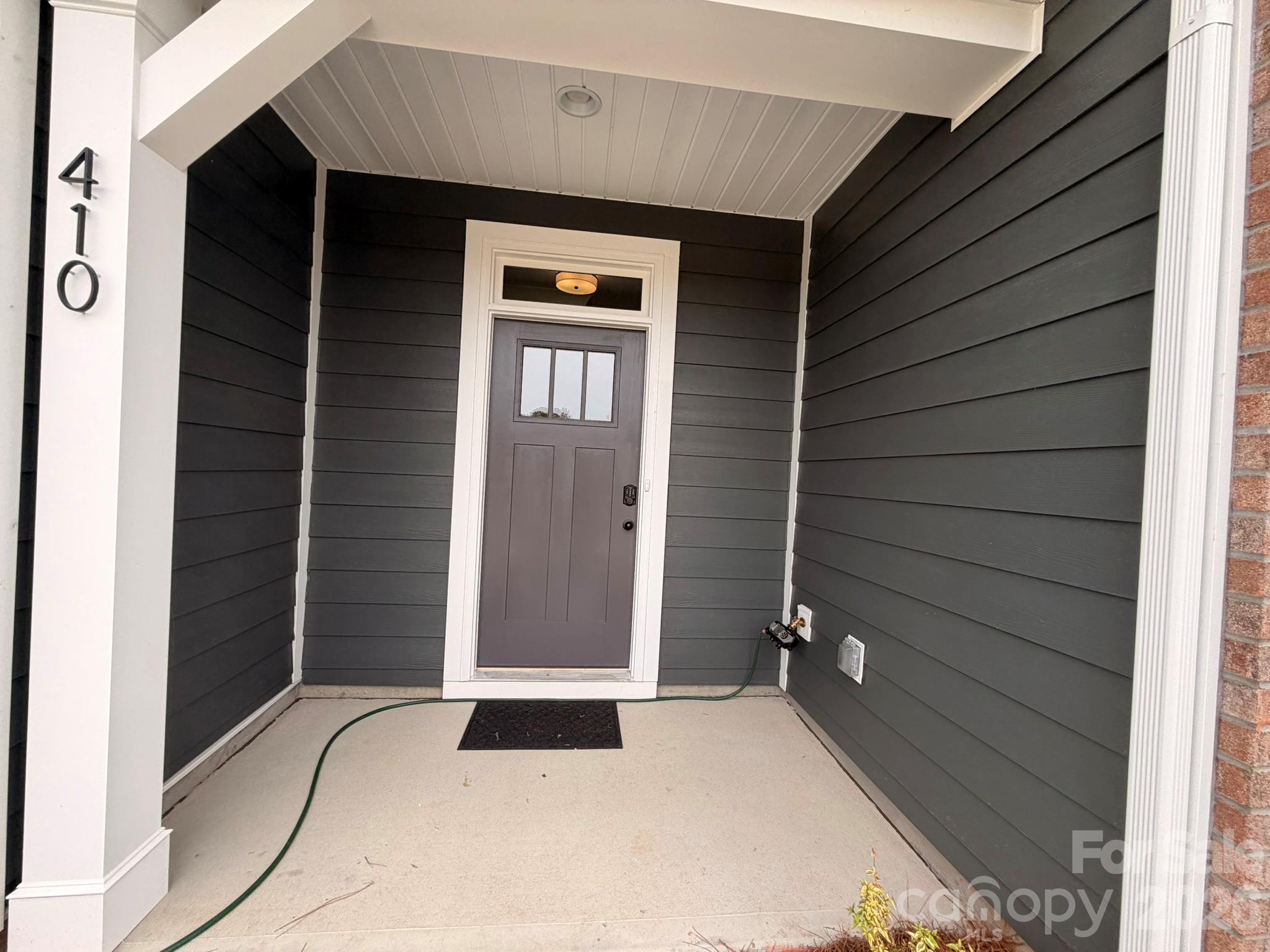 Front porch - 410 Blythe Townhome Lane, Waxhaw