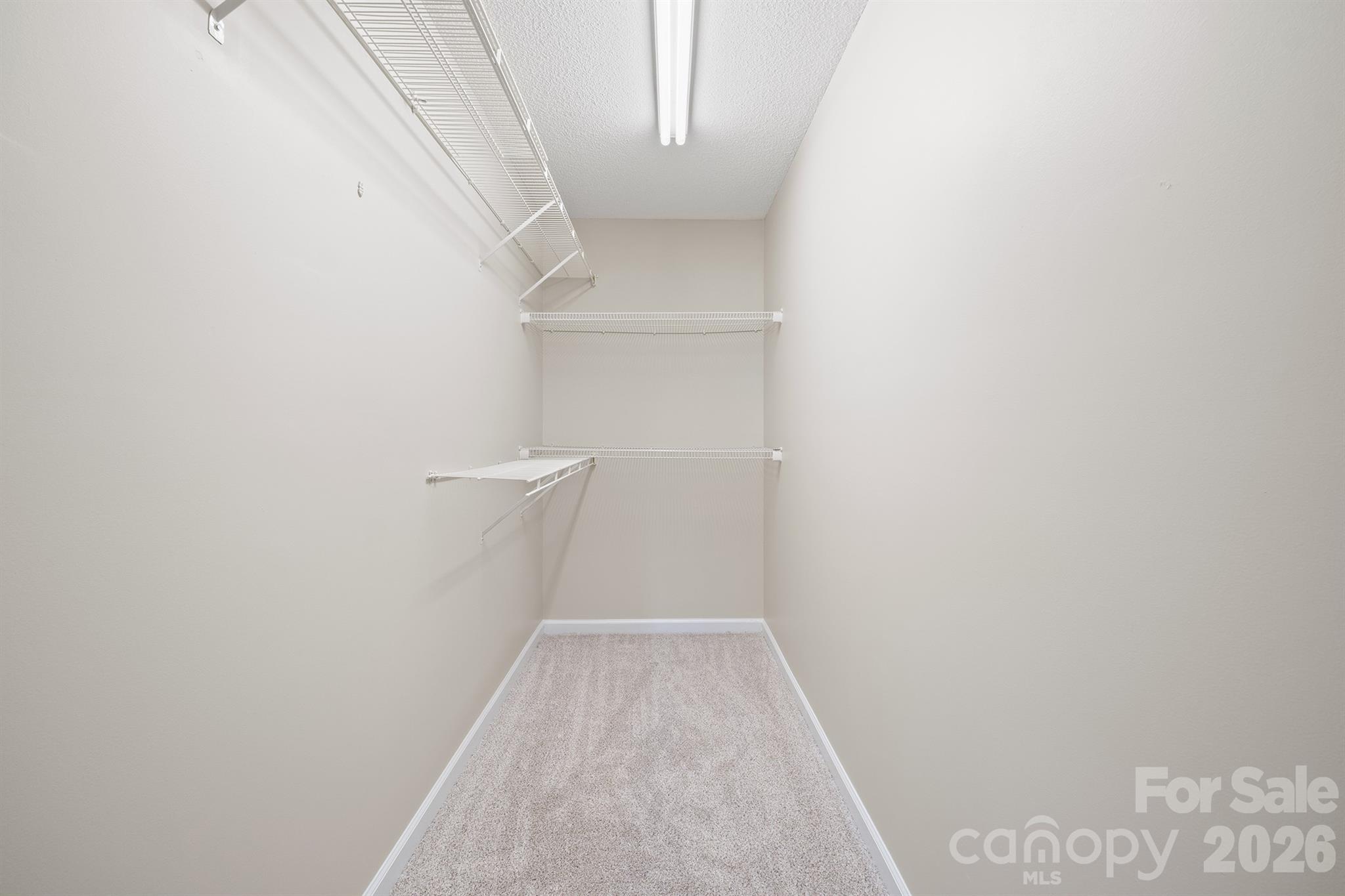 Primary walk in closet - 1061 Isenhour Court, Maiden