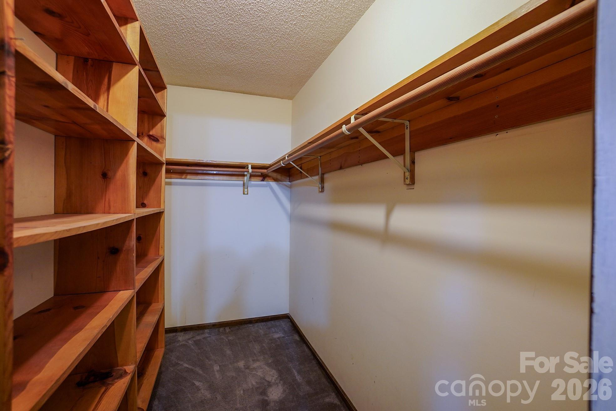 one of two primary walk in closets - 3576 Julian Welborn Drive, Morganton