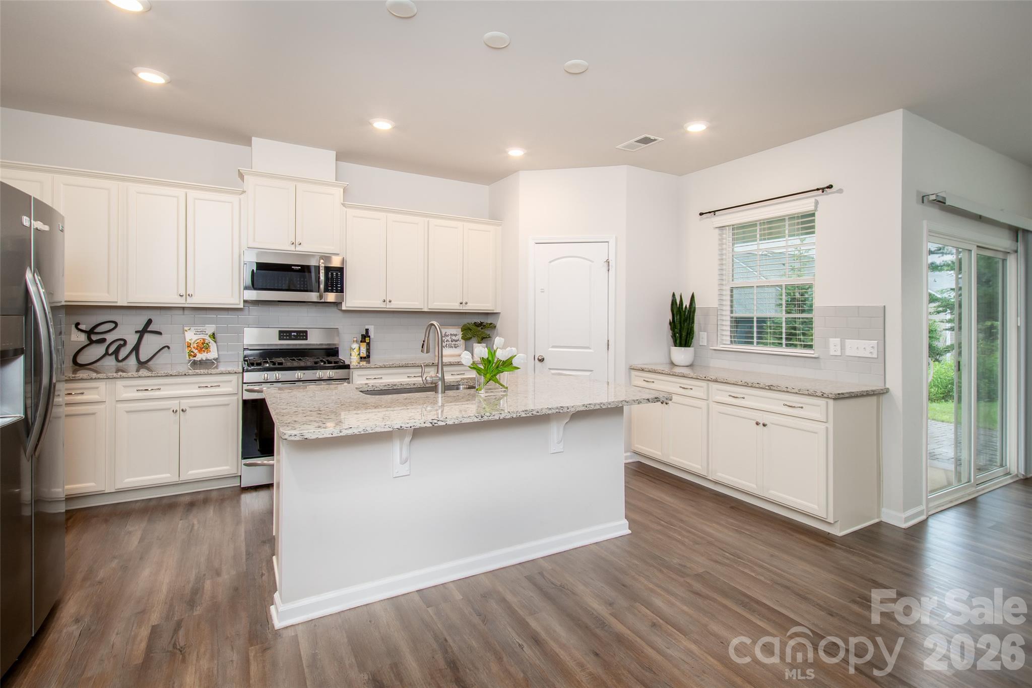 Crisp-White Cabinets And Granite Countertops - 150 W Morehouse Avenue, Mooresville